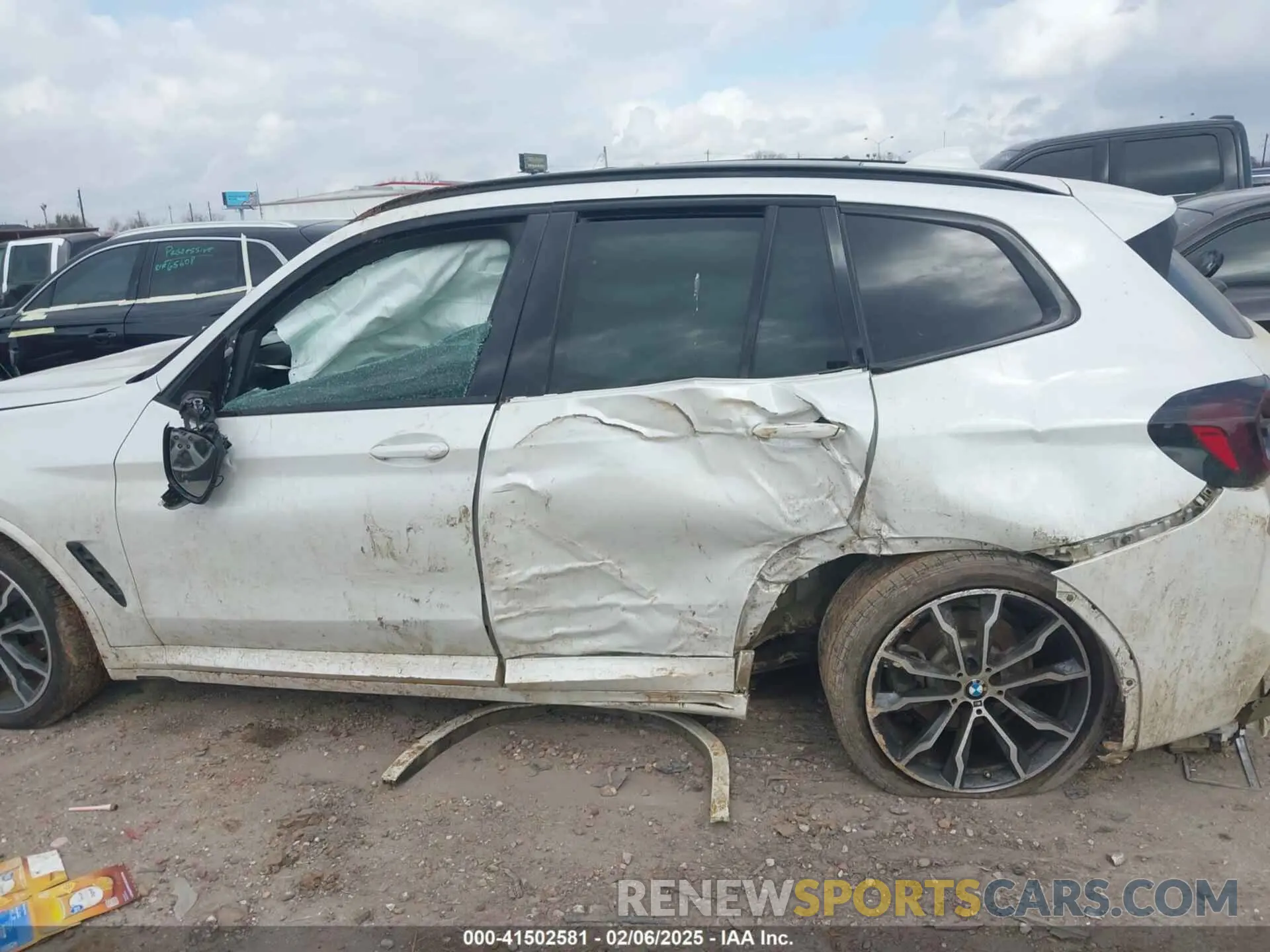 13 Photograph of a damaged car 5UX53DP09N9M44229 BMW X3 2022