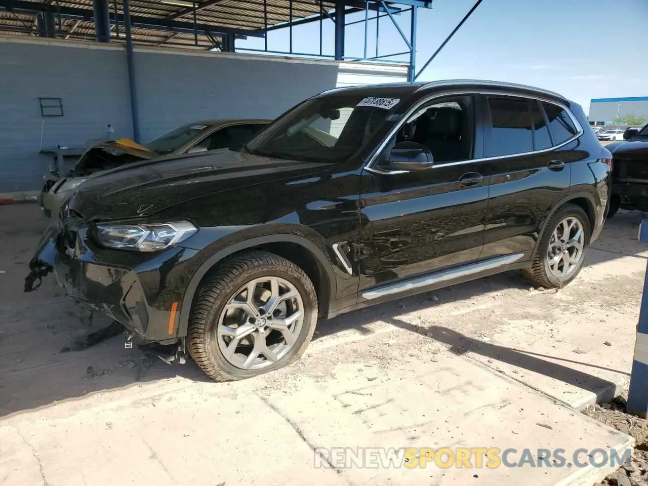 1 Photograph of a damaged car 5UX53DP09N9N35100 BMW X3 2022