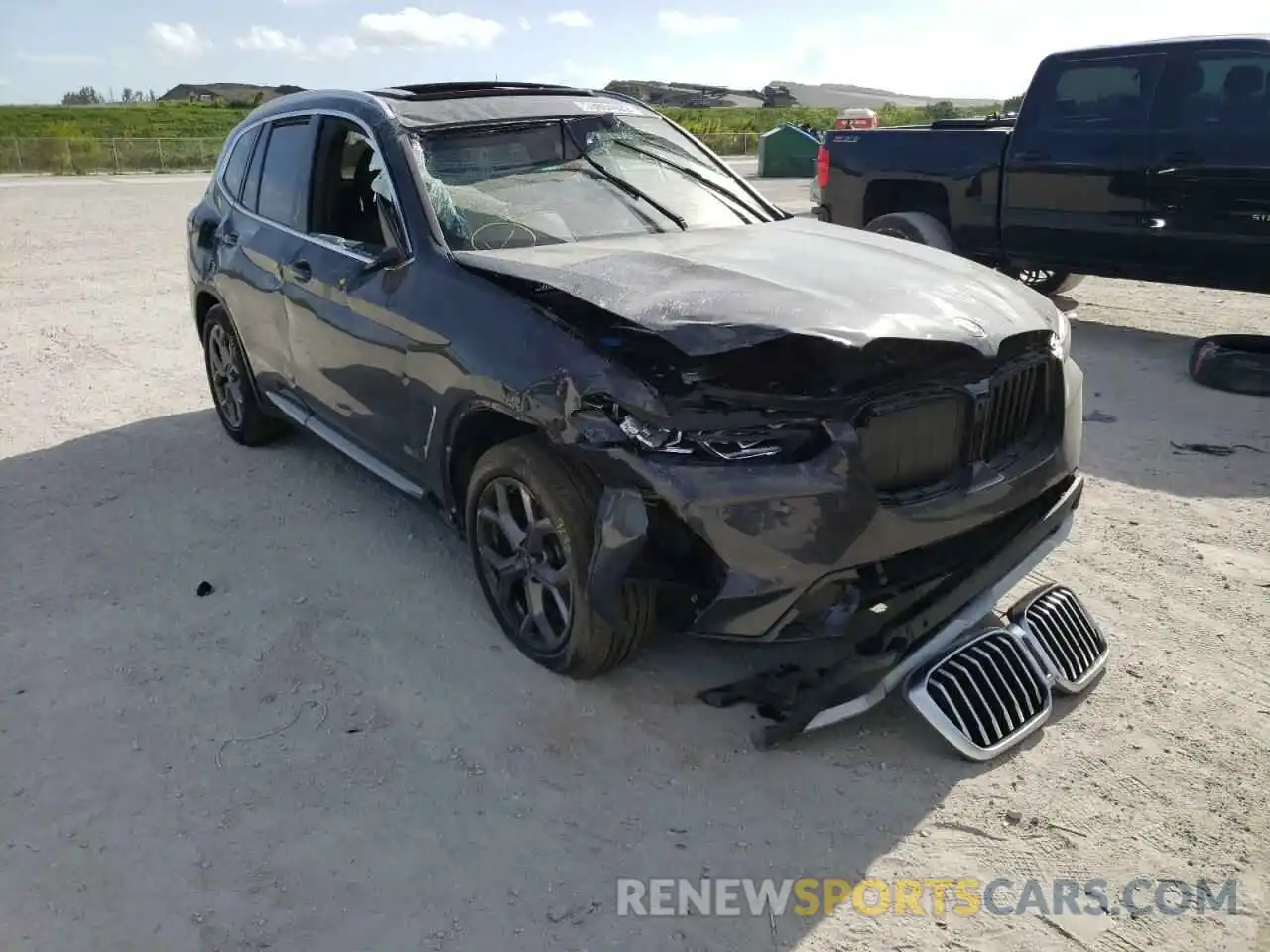 1 Photograph of a damaged car 5UX53DP0XN9K84605 BMW X3 2022