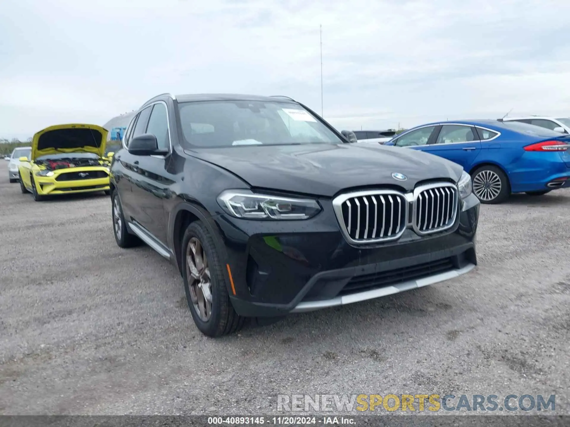 1 Photograph of a damaged car 5UX53DP0XN9L20969 BMW X3 2022
