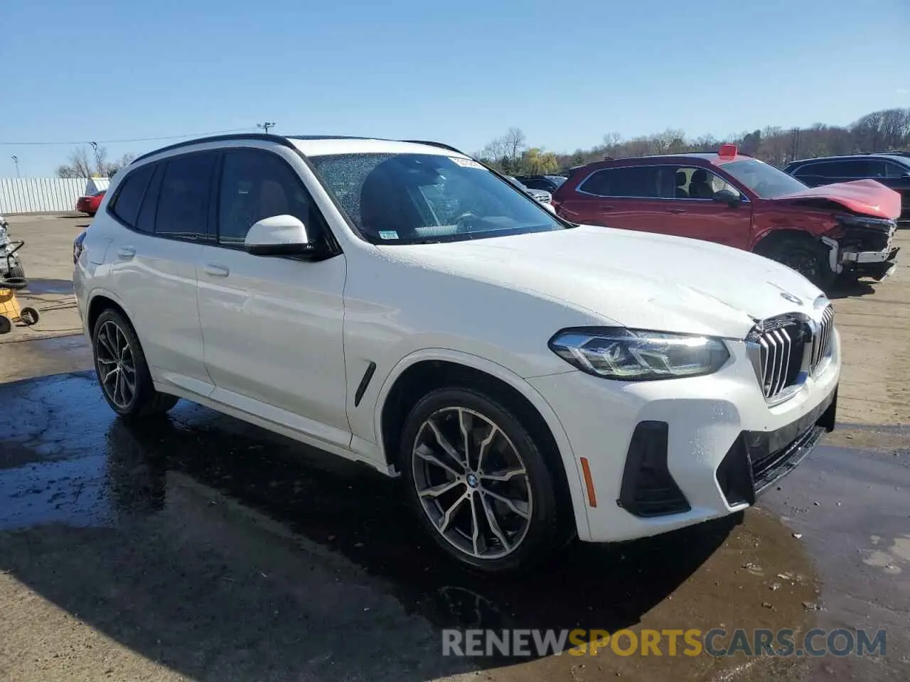 4 Photograph of a damaged car 5UX53DP0XN9M46412 BMW X3 2022