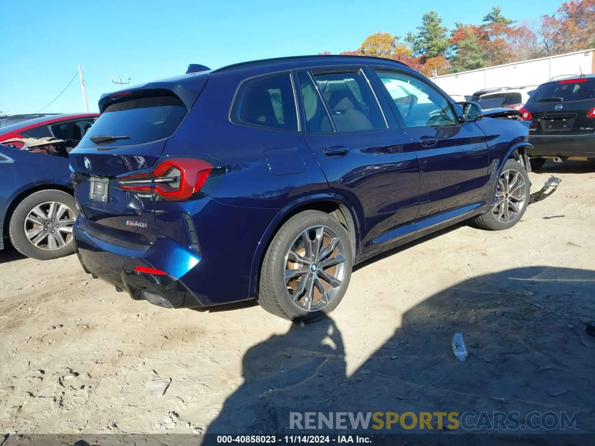 4 Photograph of a damaged car 5UX83DP06N9K71590 BMW X3 2022