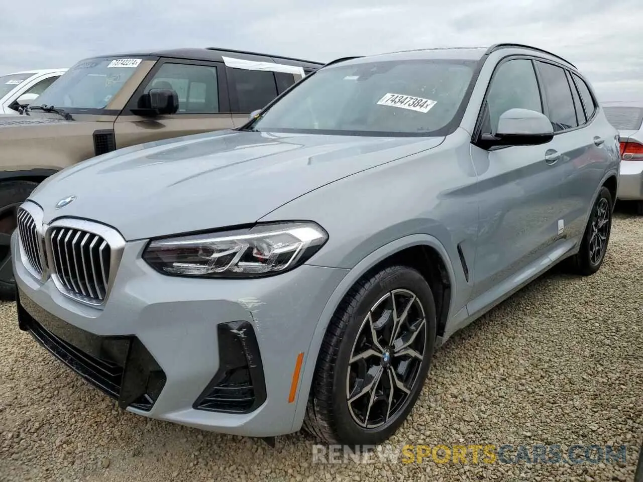 1 Photograph of a damaged car 5UX43DP00P9N56576 BMW X3 2023