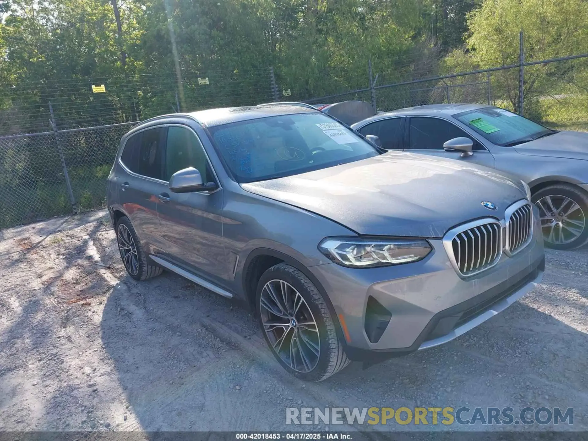 1 Photograph of a damaged car 5UX43DP00P9S59680 BMW X3 2023