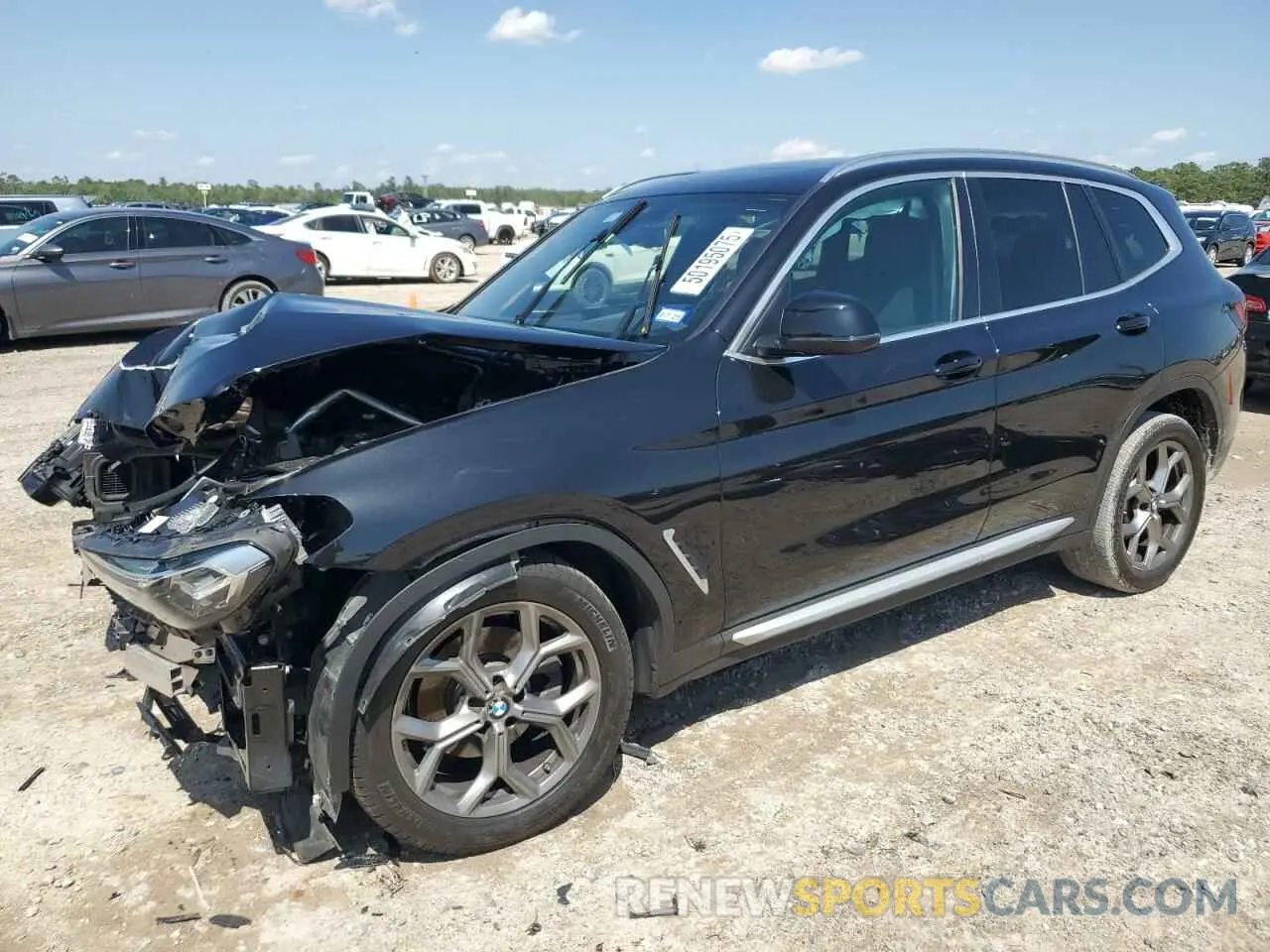 1 Photograph of a damaged car 5UX43DP01P9R45761 BMW X3 2023