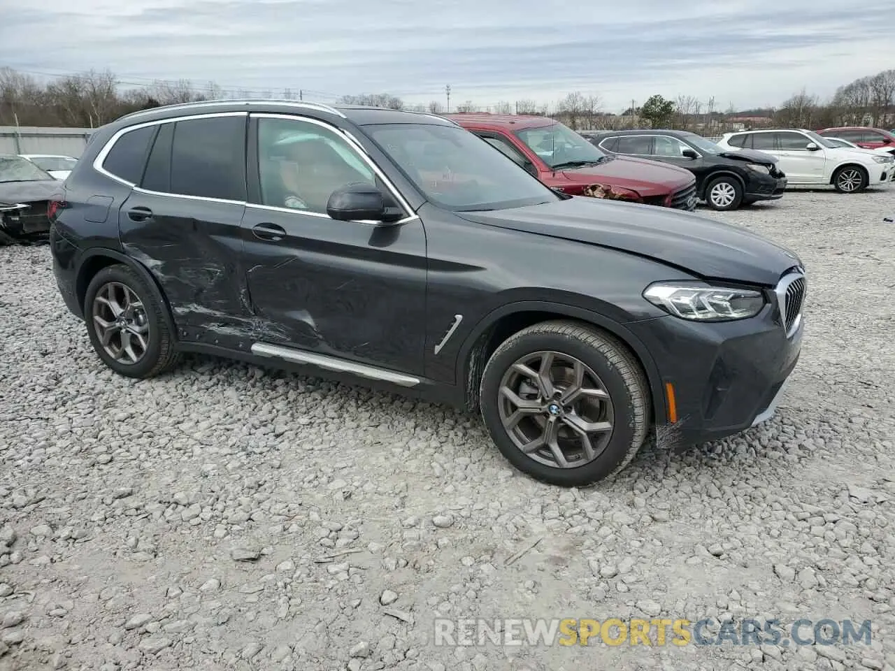 4 Photograph of a damaged car 5UX43DP01P9T33785 BMW X3 2023