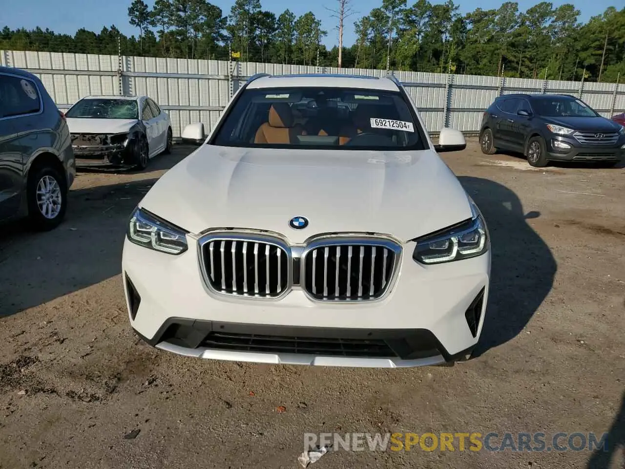 5 Photograph of a damaged car 5UX43DP03P9R67440 BMW X3 2023