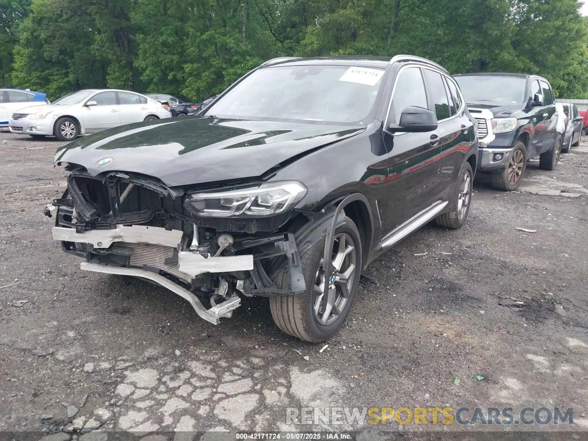 2 Photograph of a damaged car 5UX43DP04P9S20204 BMW X3 2023