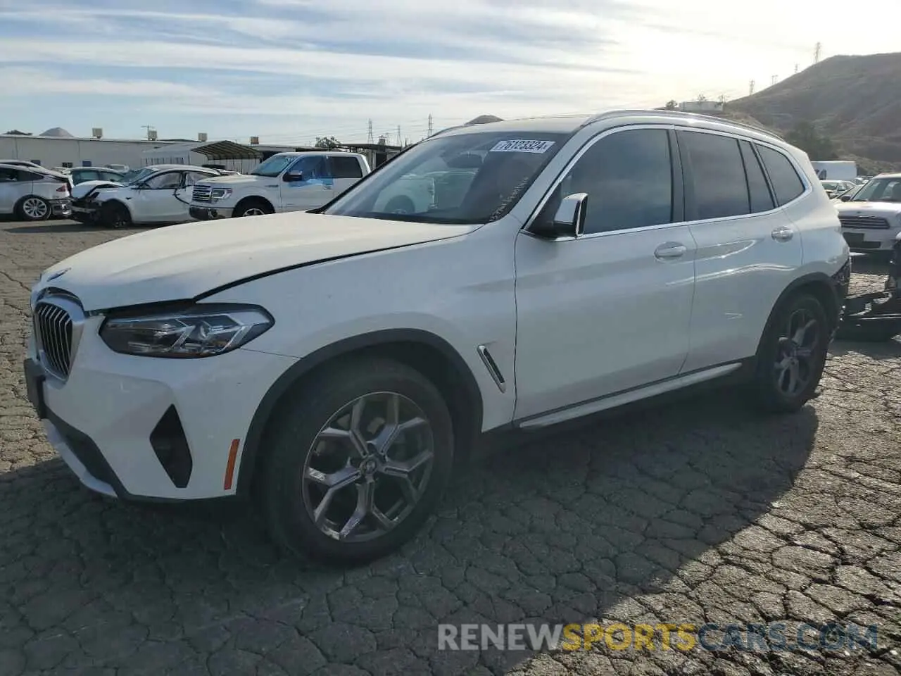 1 Photograph of a damaged car 5UX43DP05P9P32019 BMW X3 2023