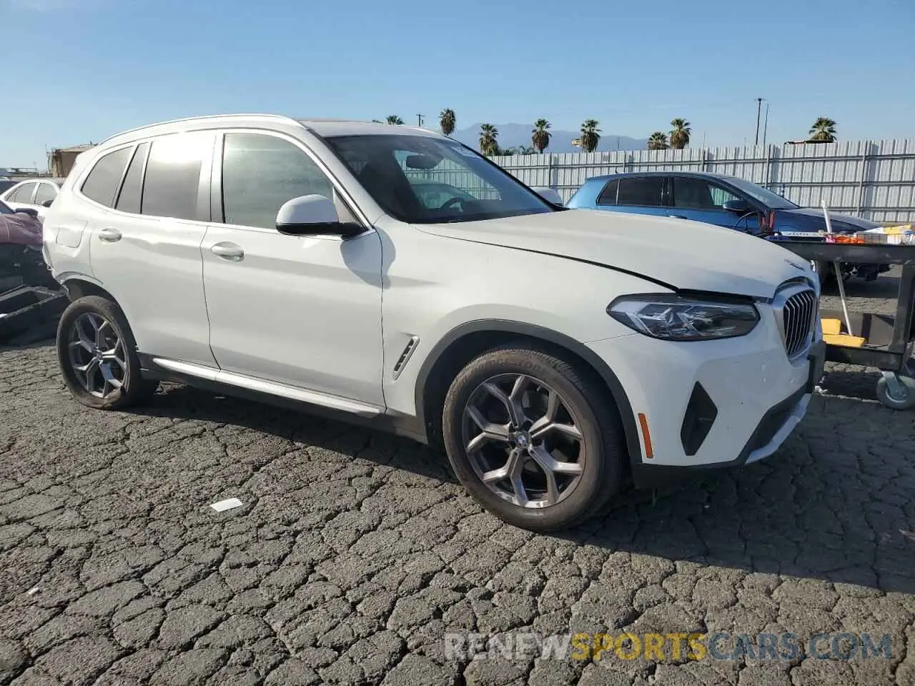 4 Photograph of a damaged car 5UX43DP05P9P32019 BMW X3 2023