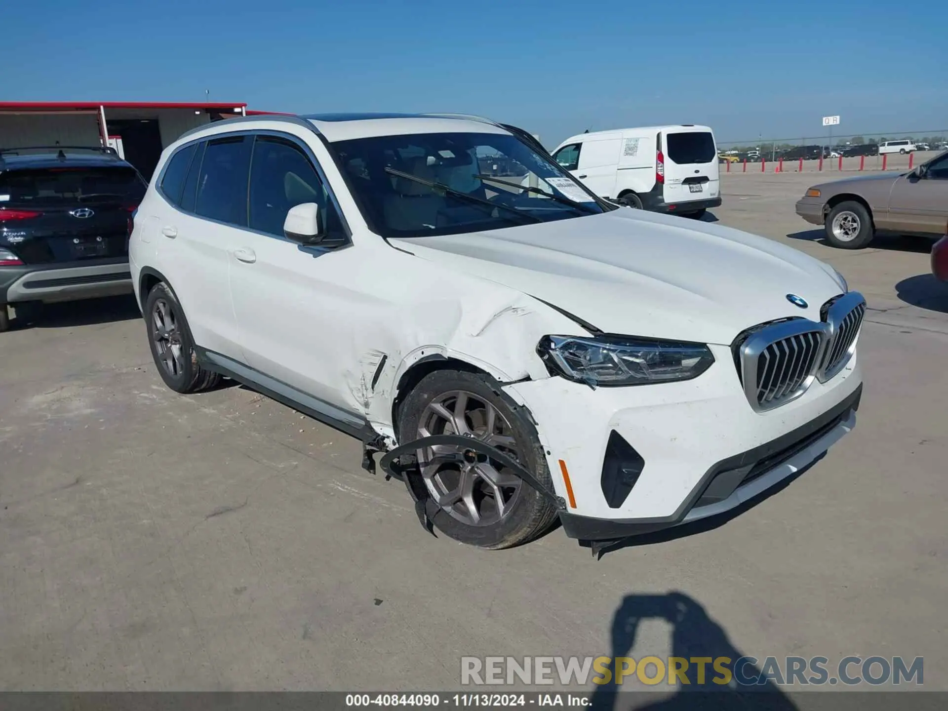 1 Photograph of a damaged car 5UX43DP06P9R03859 BMW X3 2023