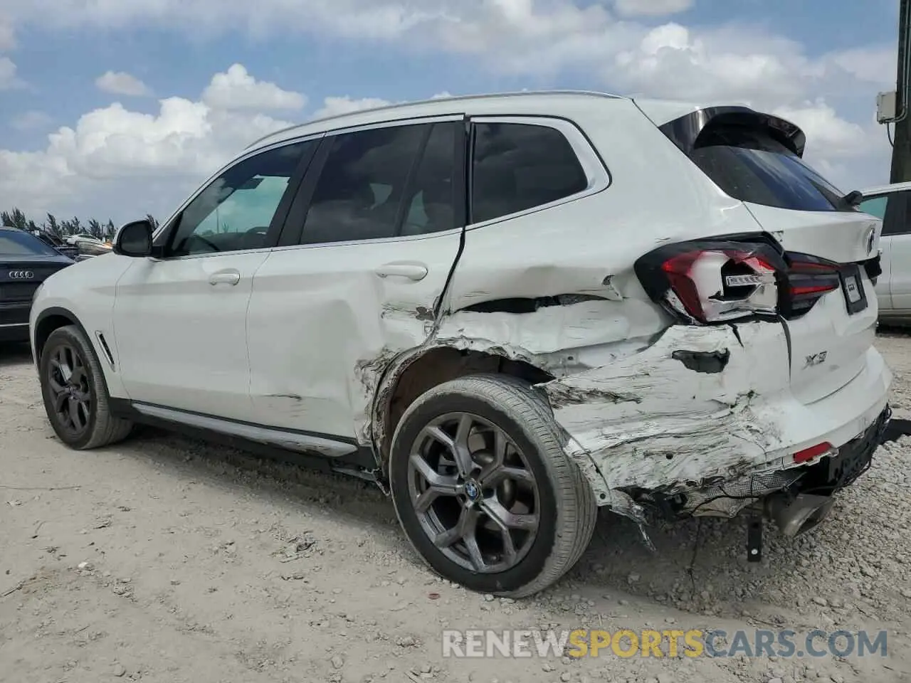 2 Photograph of a damaged car 5UX43DP06P9T04654 BMW X3 2023