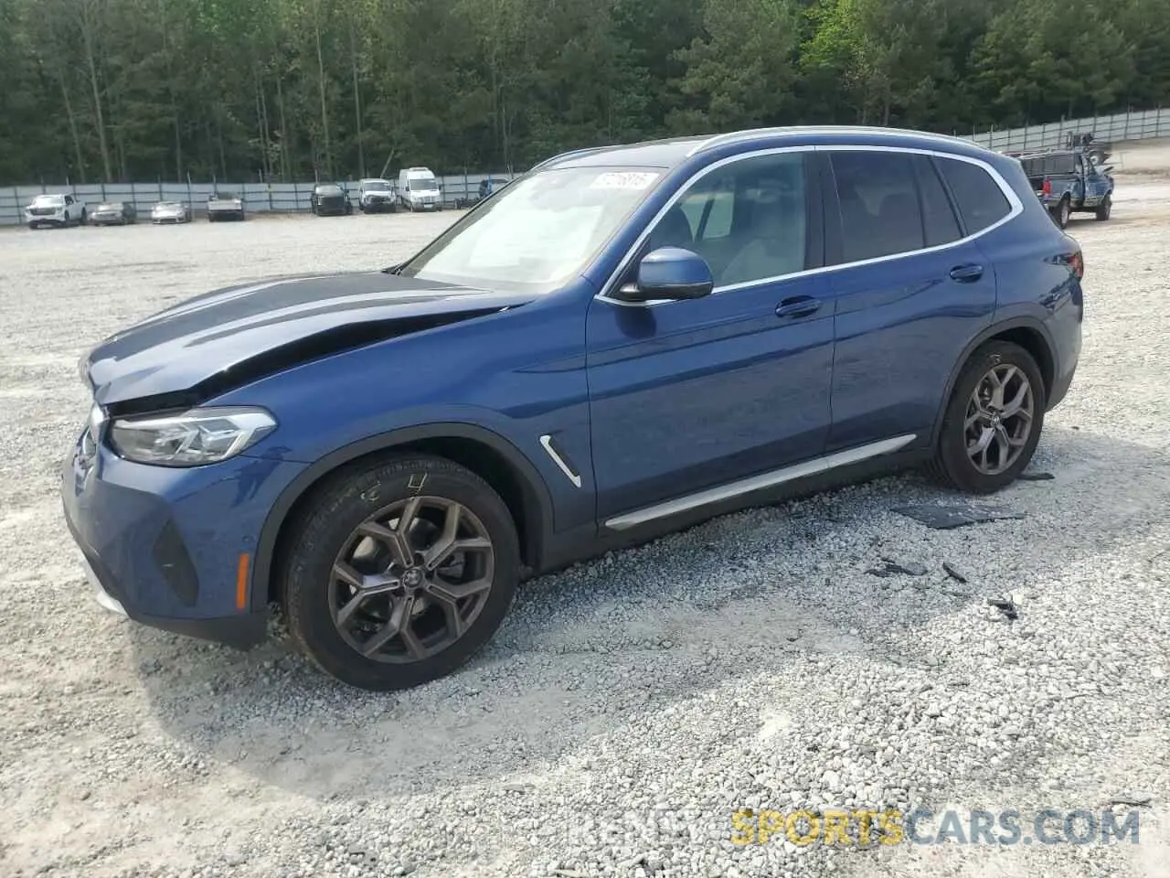 1 Photograph of a damaged car 5UX43DP07P9S19242 BMW X3 2023