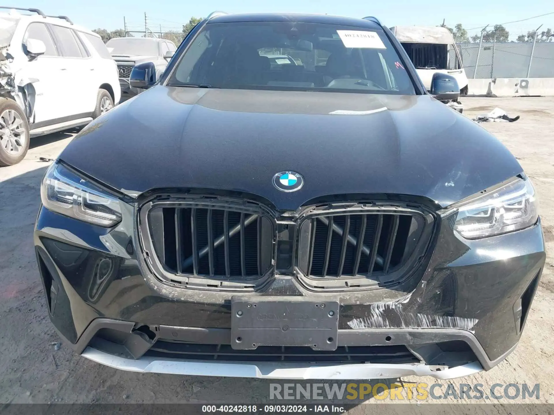 13 Photograph of a damaged car 5UX43DP08P9P10130 BMW X3 2023