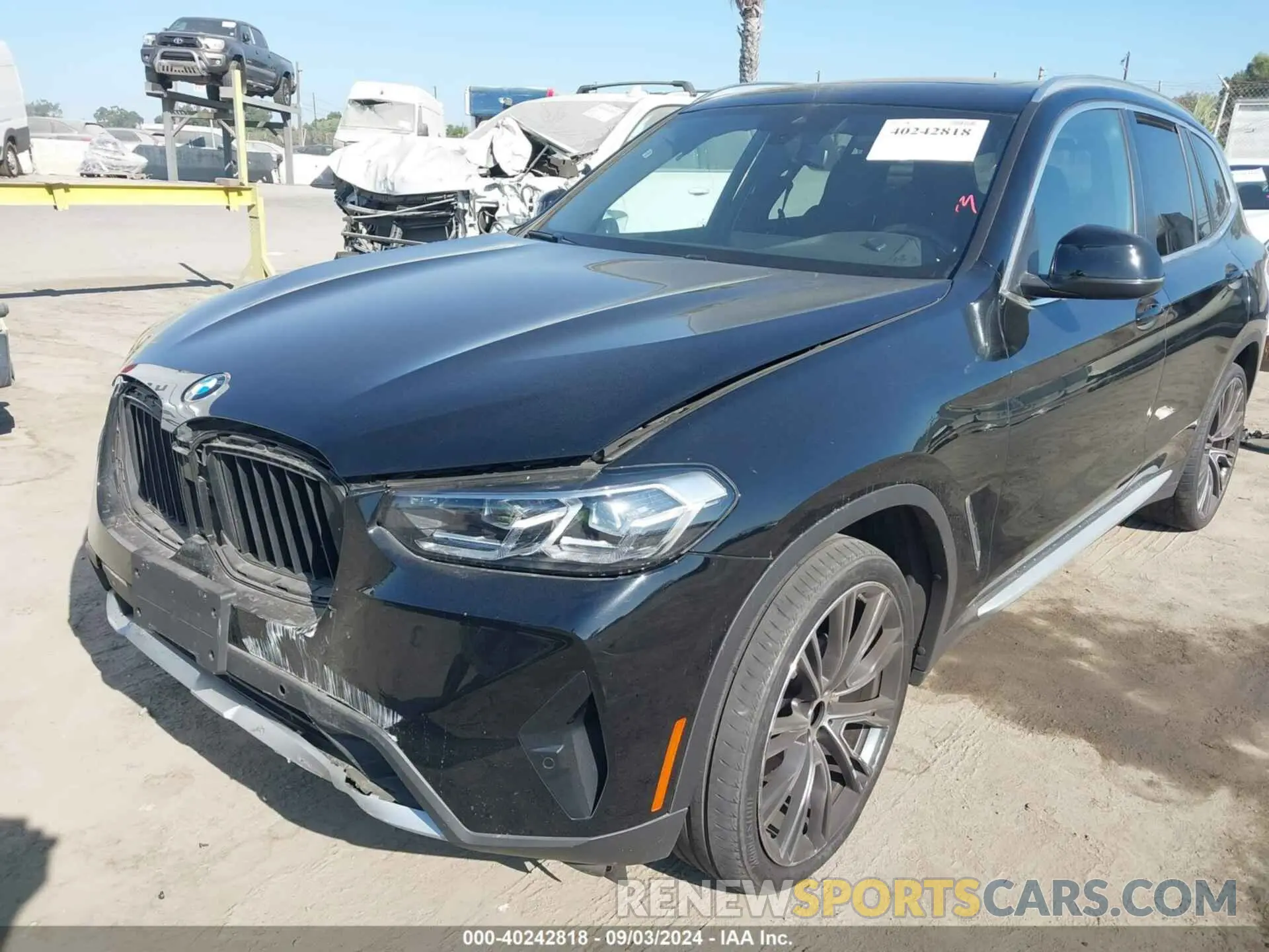 2 Photograph of a damaged car 5UX43DP08P9P10130 BMW X3 2023