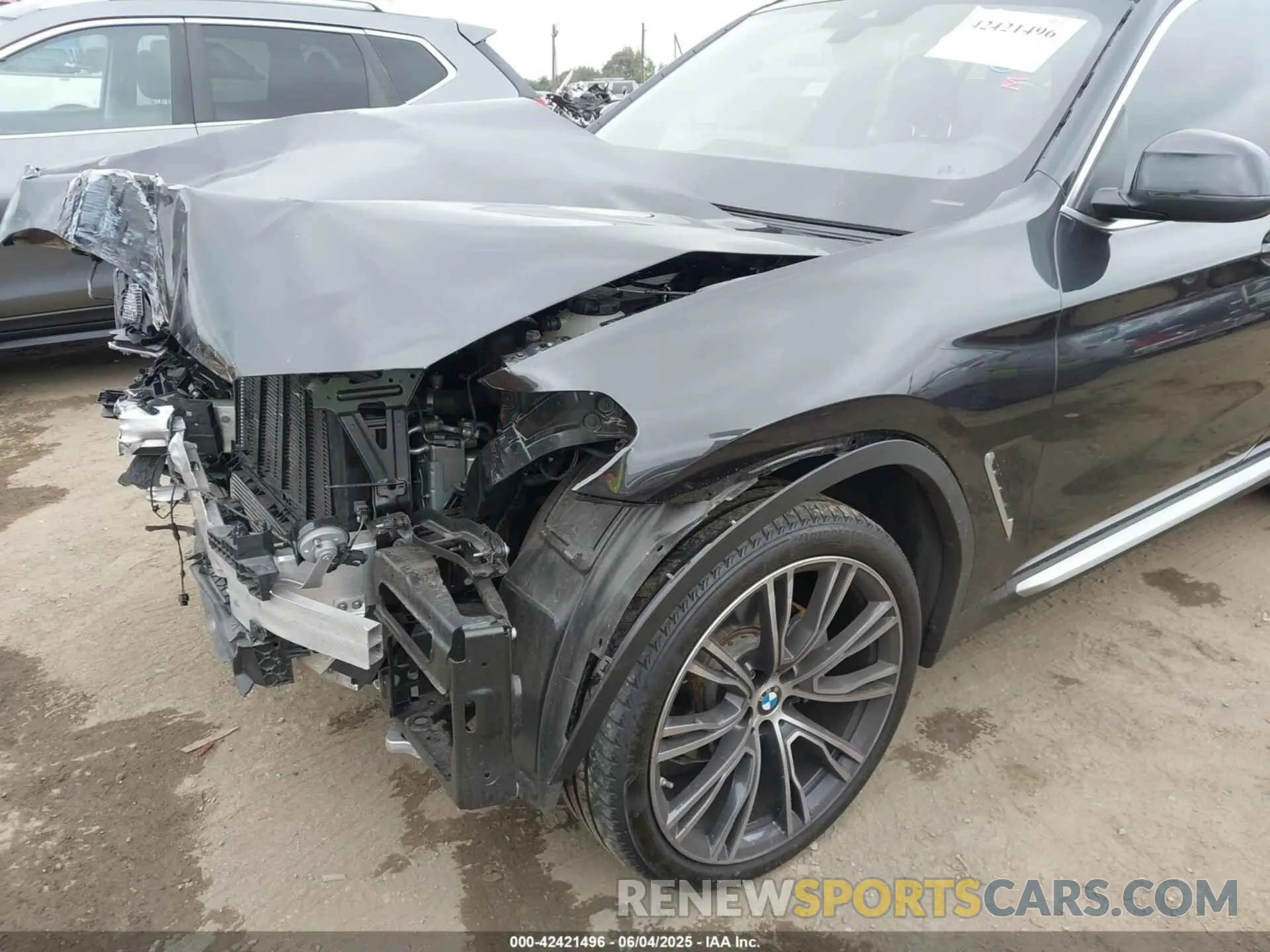 19 Photograph of a damaged car 5UX43DP08P9R73430 BMW X3 2023