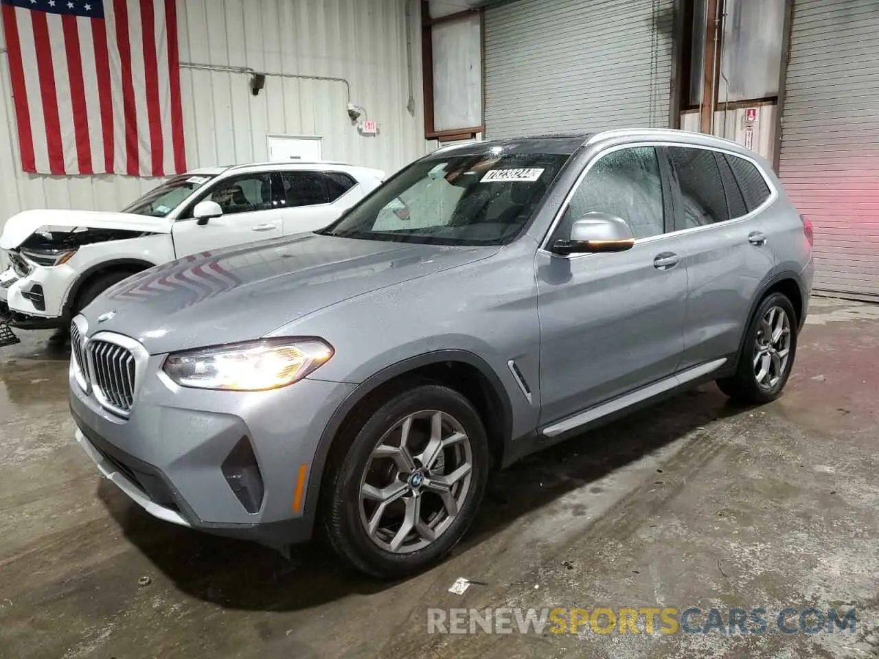 1 Photograph of a damaged car 5UX53DP01P9R75587 BMW X3 2023