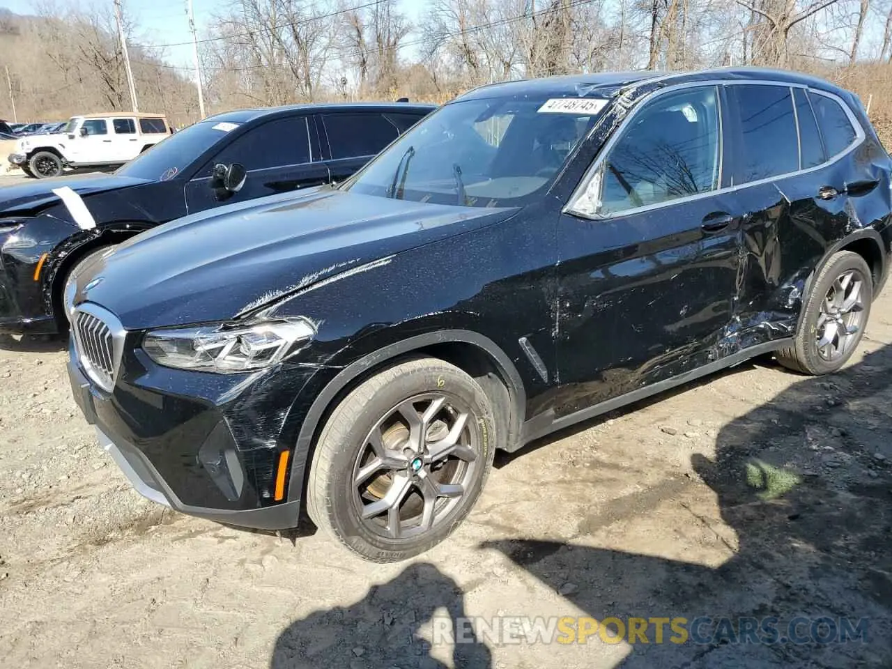 1 Photograph of a damaged car 5UX53DP01P9R97895 BMW X3 2023