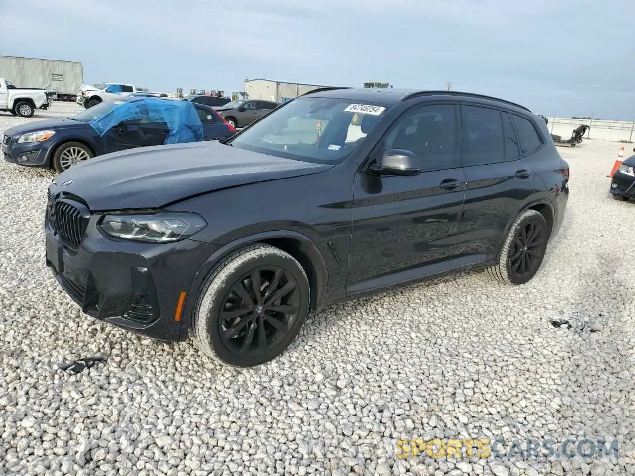 1 Photograph of a damaged car 5UX53DP03P9R92469 BMW X3 2023