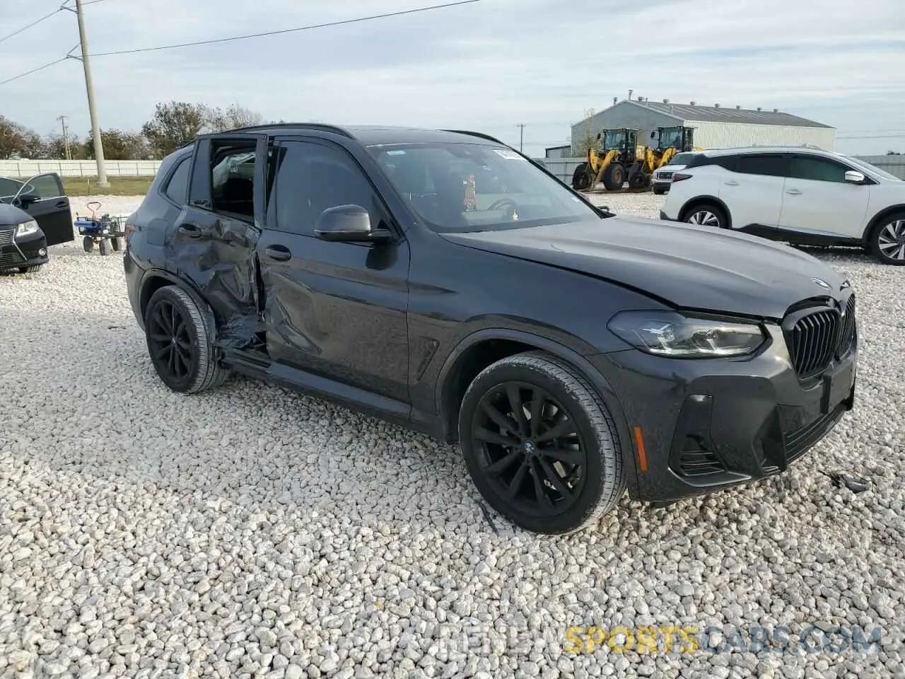 4 Photograph of a damaged car 5UX53DP03P9R92469 BMW X3 2023