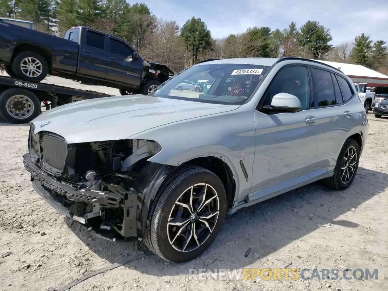 1 Photograph of a damaged car 5UX53DP04P9P91065 BMW X3 2023
