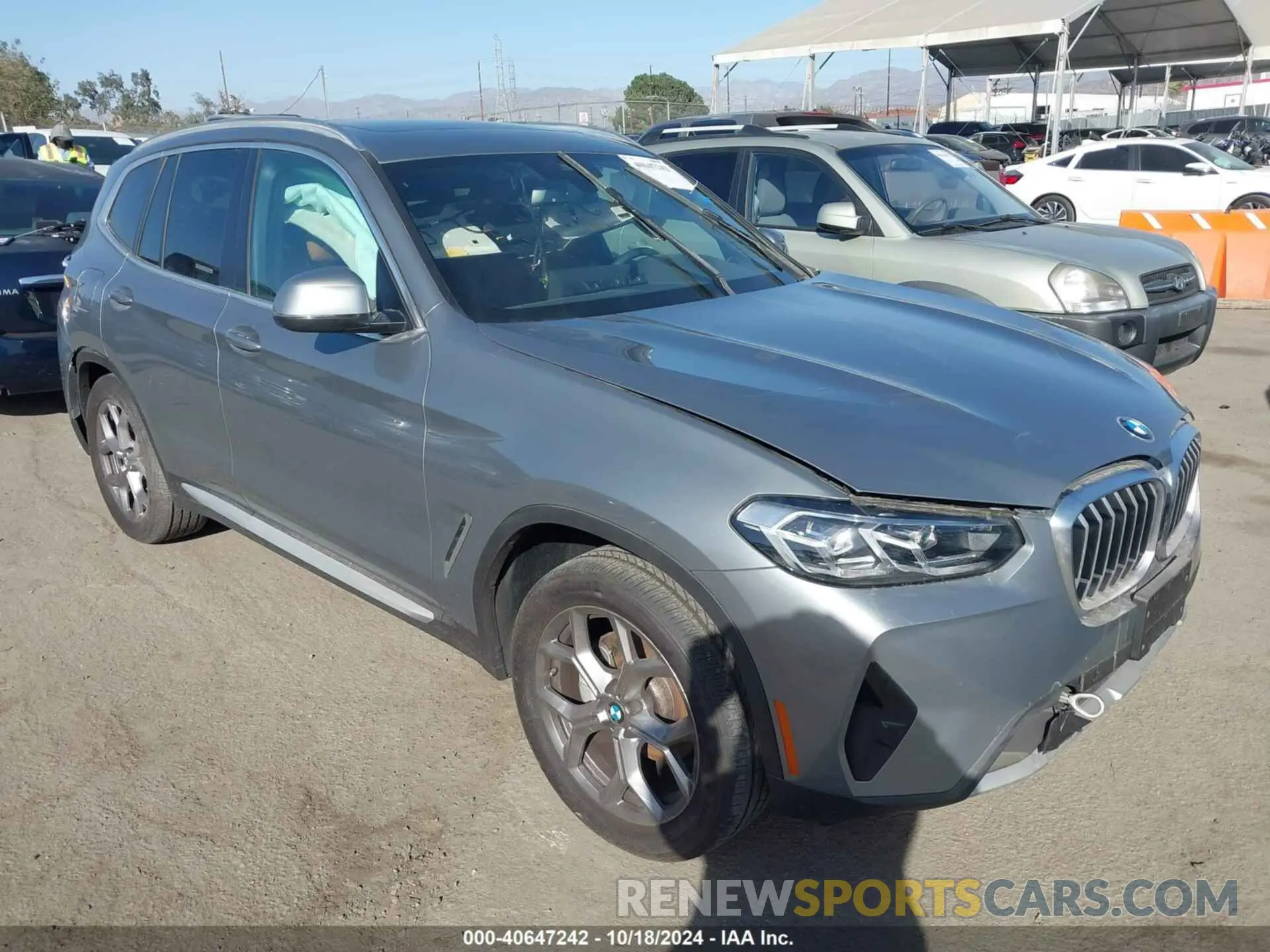 1 Photograph of a damaged car 5UX53DP06P9S97385 BMW X3 2023