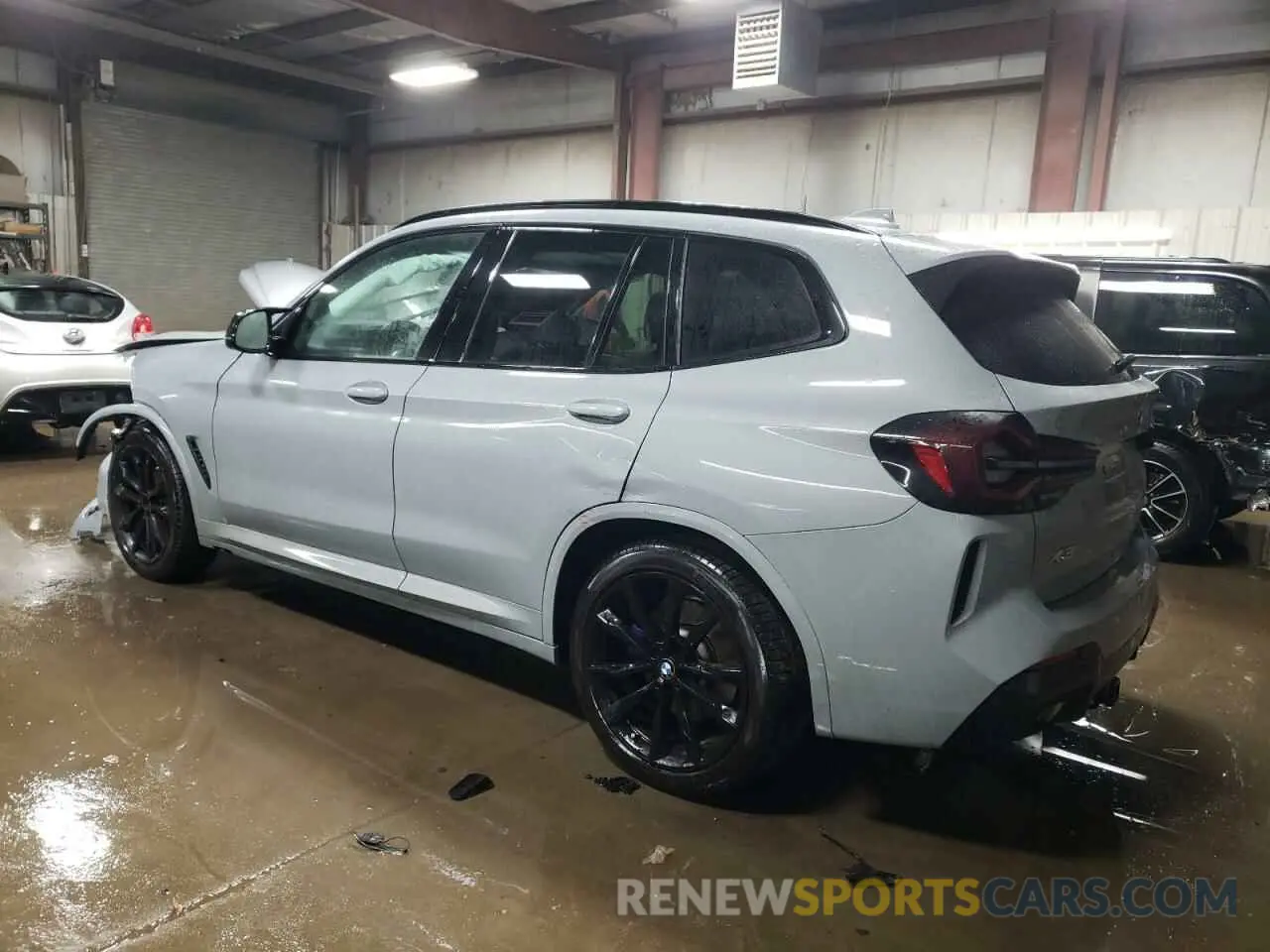 2 Photograph of a damaged car 5UX53DP08P9P40071 BMW X3 2023