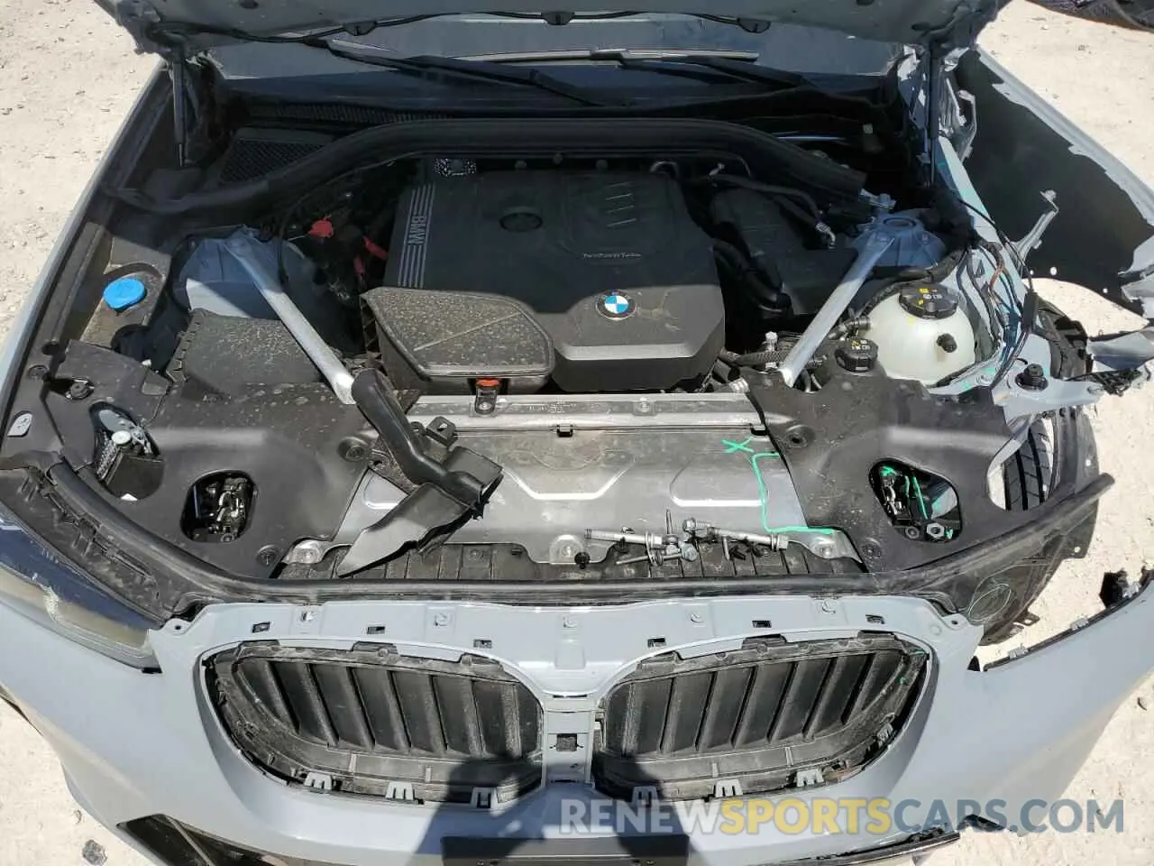12 Photograph of a damaged car 5UX43DP0XR9X30530 BMW X3 2024