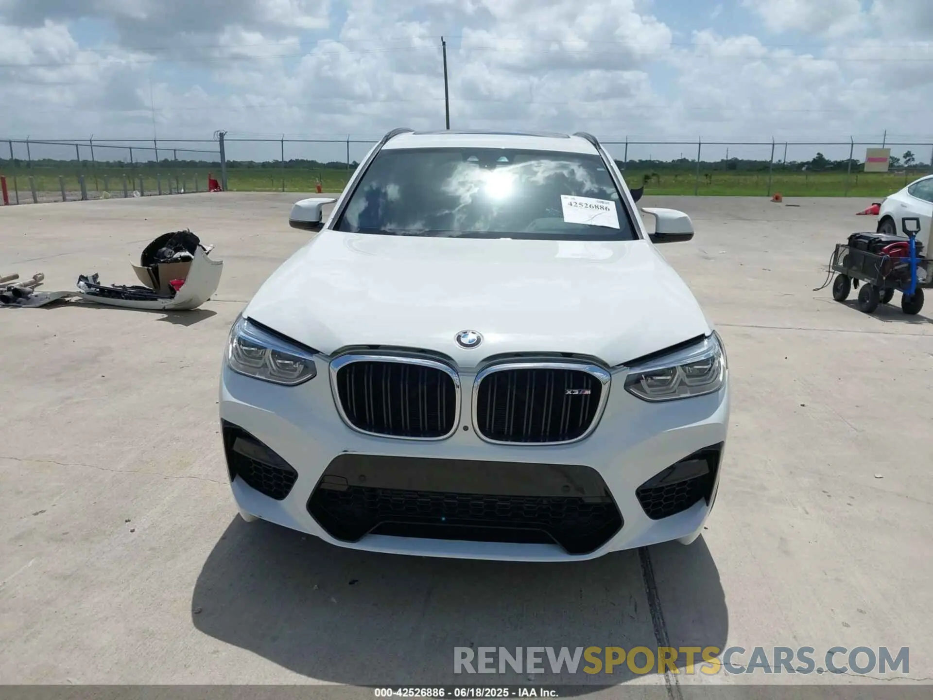 12 Photograph of a damaged car 5YMTS0C05L9C87865 BMW X3 M 2020