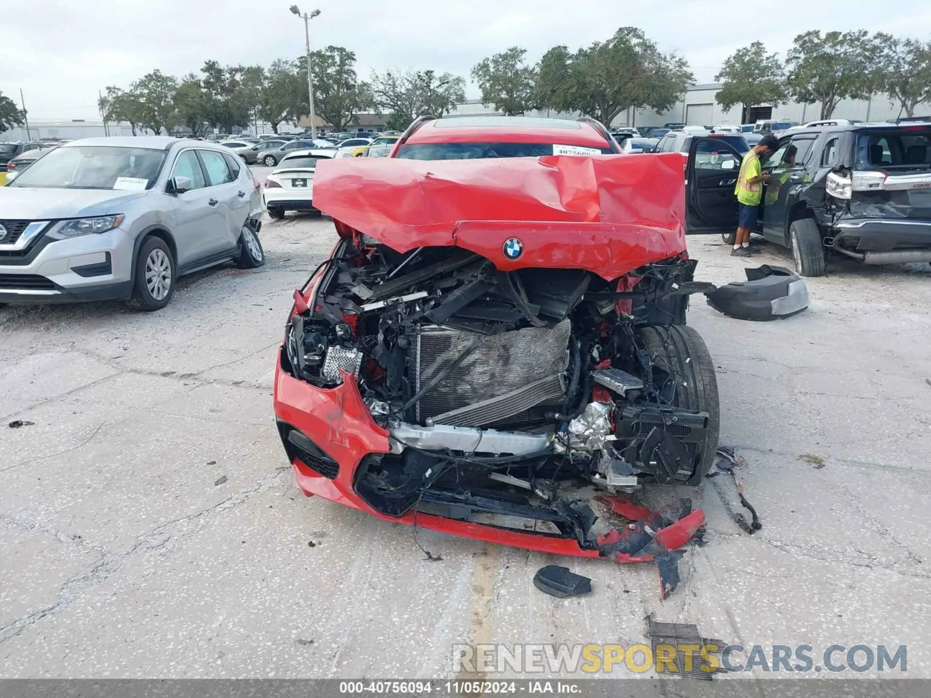 12 Photograph of a damaged car 5YMTS0C08L9B70233 BMW X3 M 2020