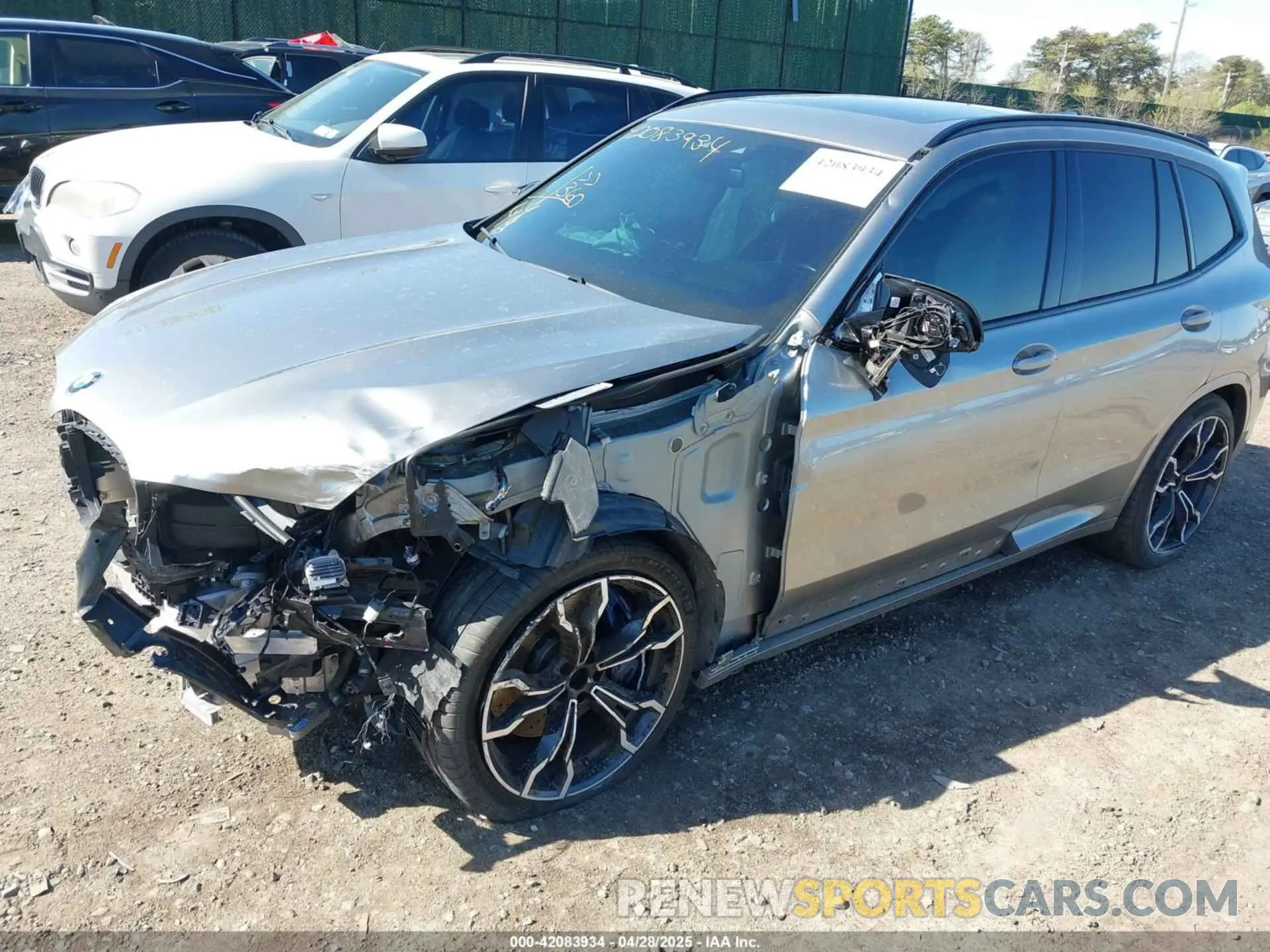 2 Photograph of a damaged car 5YMTS0C05M9H17198 BMW X3 M 2021