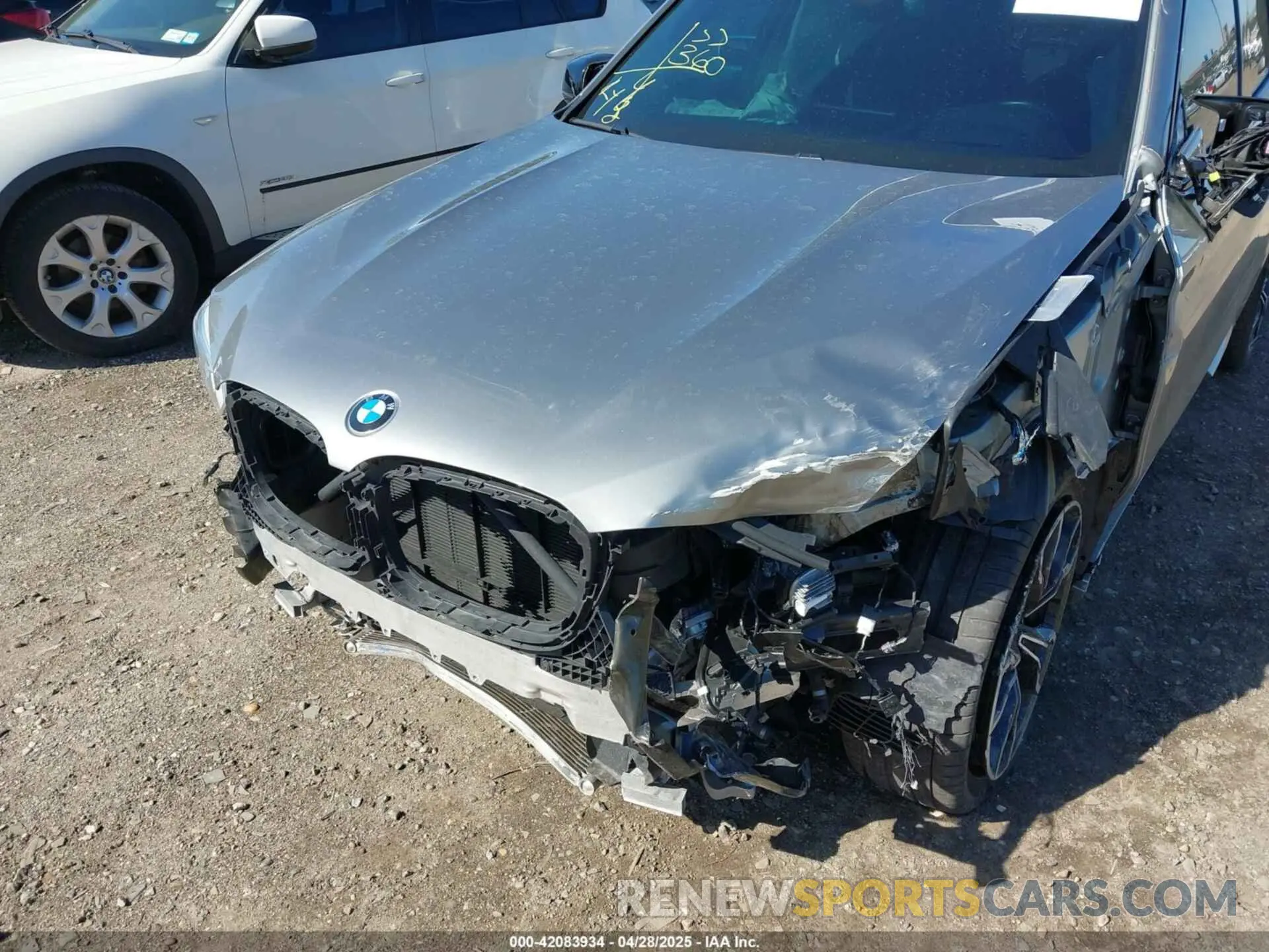 6 Photograph of a damaged car 5YMTS0C05M9H17198 BMW X3 M 2021