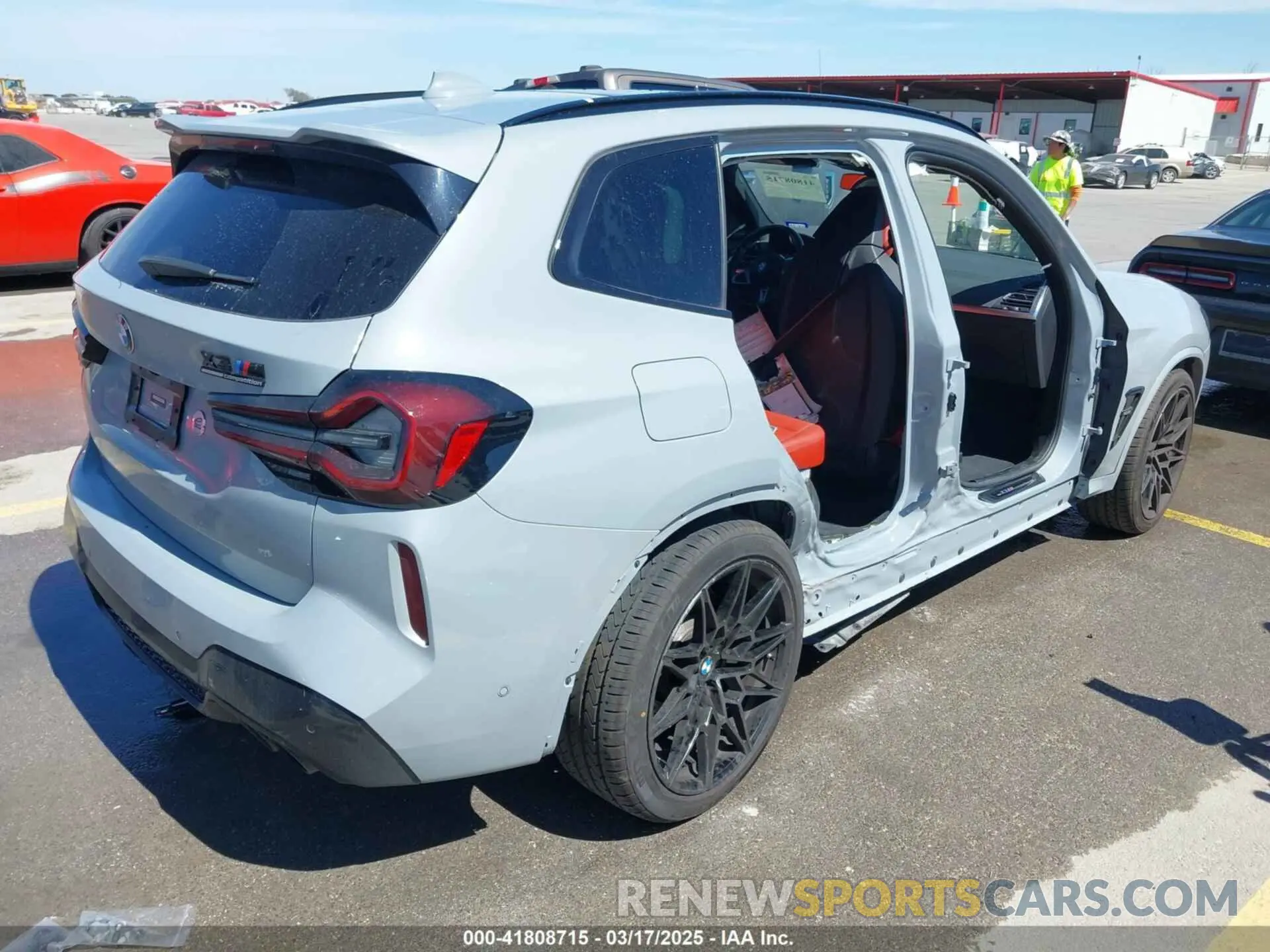 4 Photograph of a damaged car 5YM13EC03N9L12134 BMW X3 M 2022