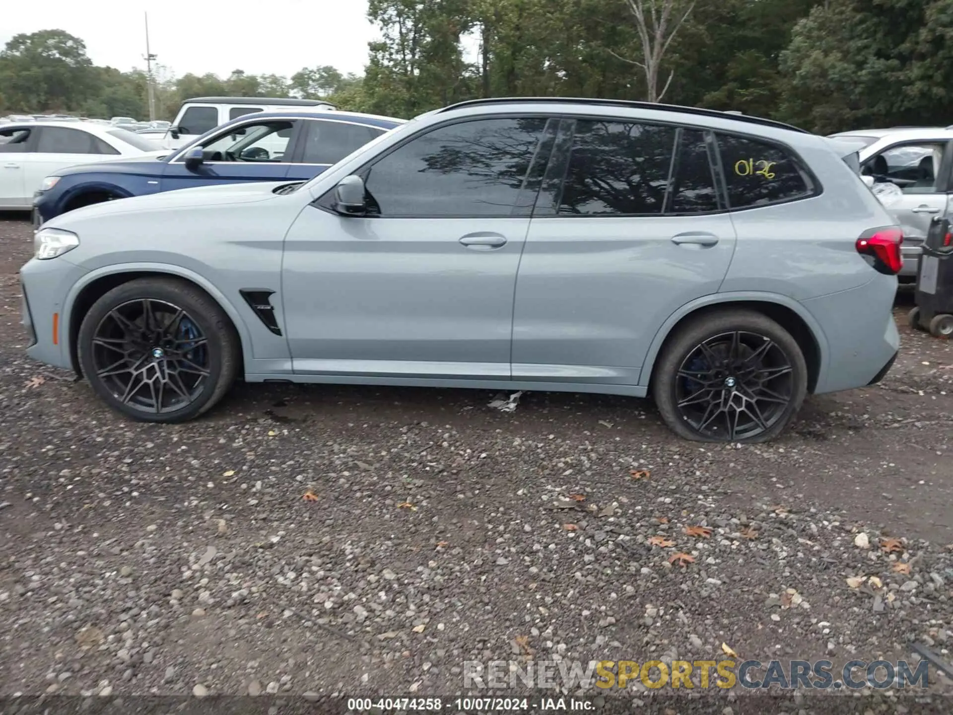 14 Photograph of a damaged car 5YM13EC05N9J89470 BMW X3 M 2022