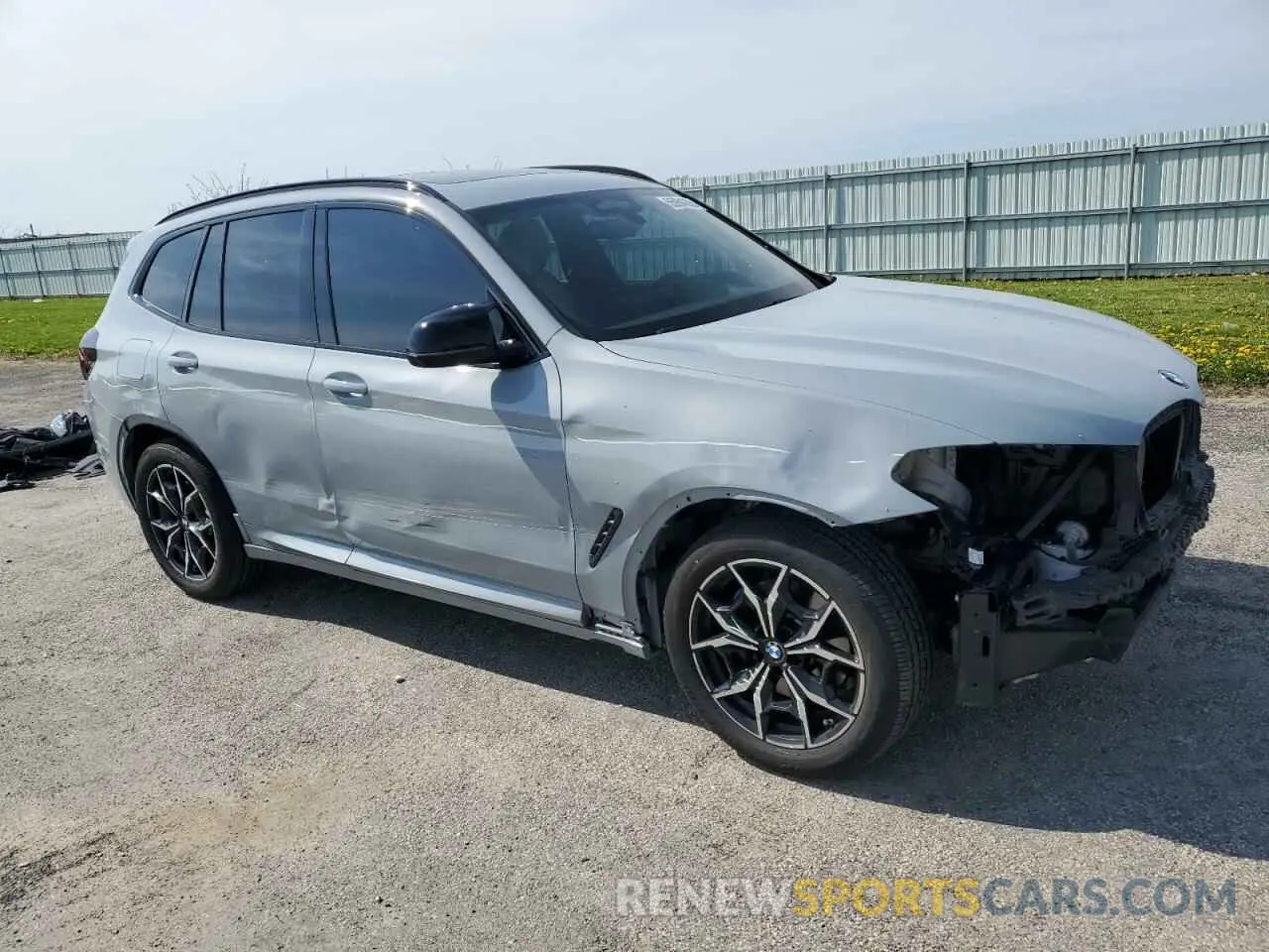 4 Photograph of a damaged car 5UX83DP01N9J87712 BMW X3 M40I 2022
