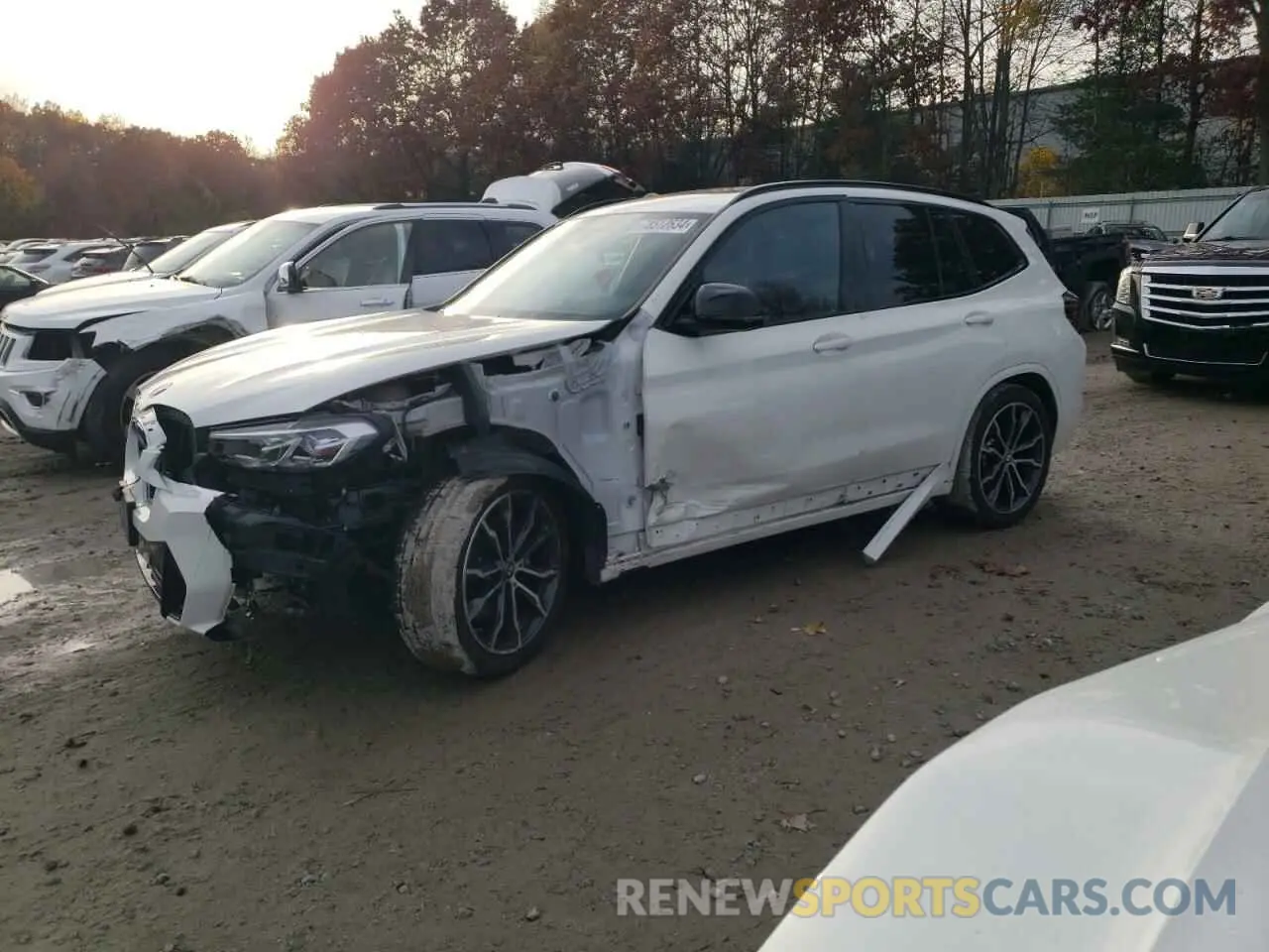 1 Photograph of a damaged car 5UX83DP04N9K02395 BMW X3 M40I 2022