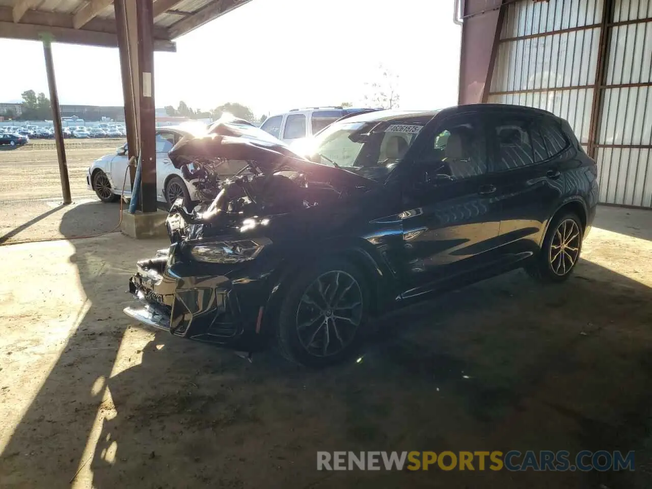 1 Photograph of a damaged car 5UX83DP0XN9J61965 BMW X3 M40I 2022