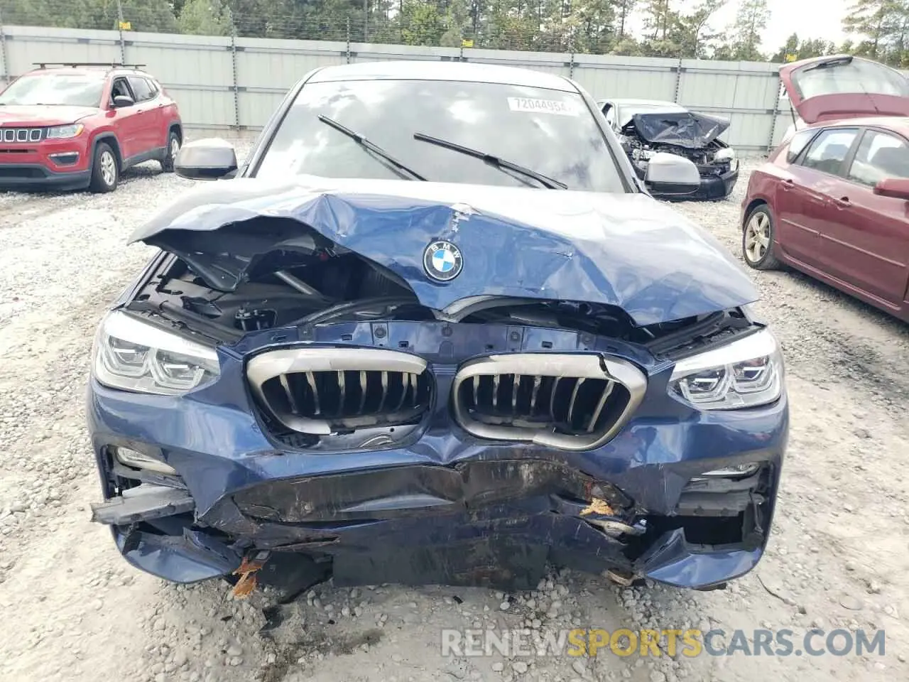 5 Photograph of a damaged car 5UXUJ5C53KLJ64409 BMW X4 2019