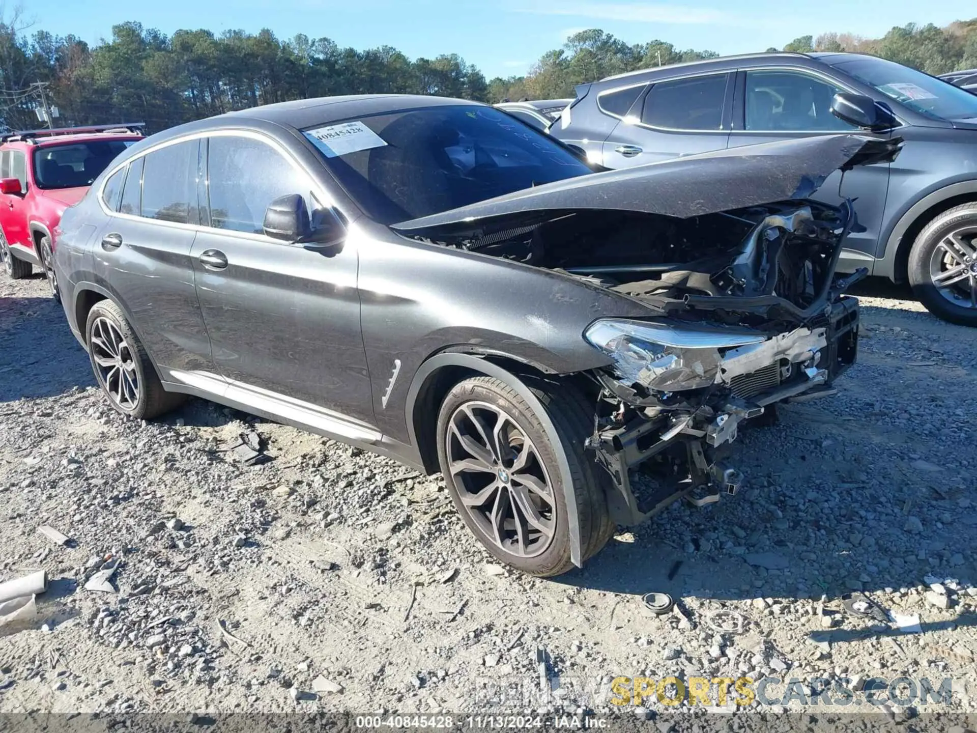 1 Photograph of a damaged car 5UX2V1C00M9F12890 BMW X4 2021