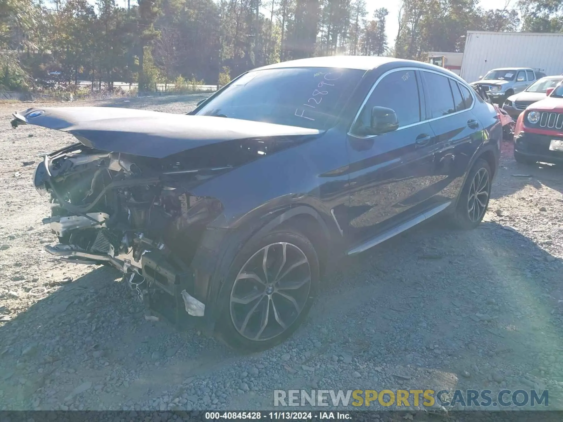 14 Photograph of a damaged car 5UX2V1C00M9F12890 BMW X4 2021