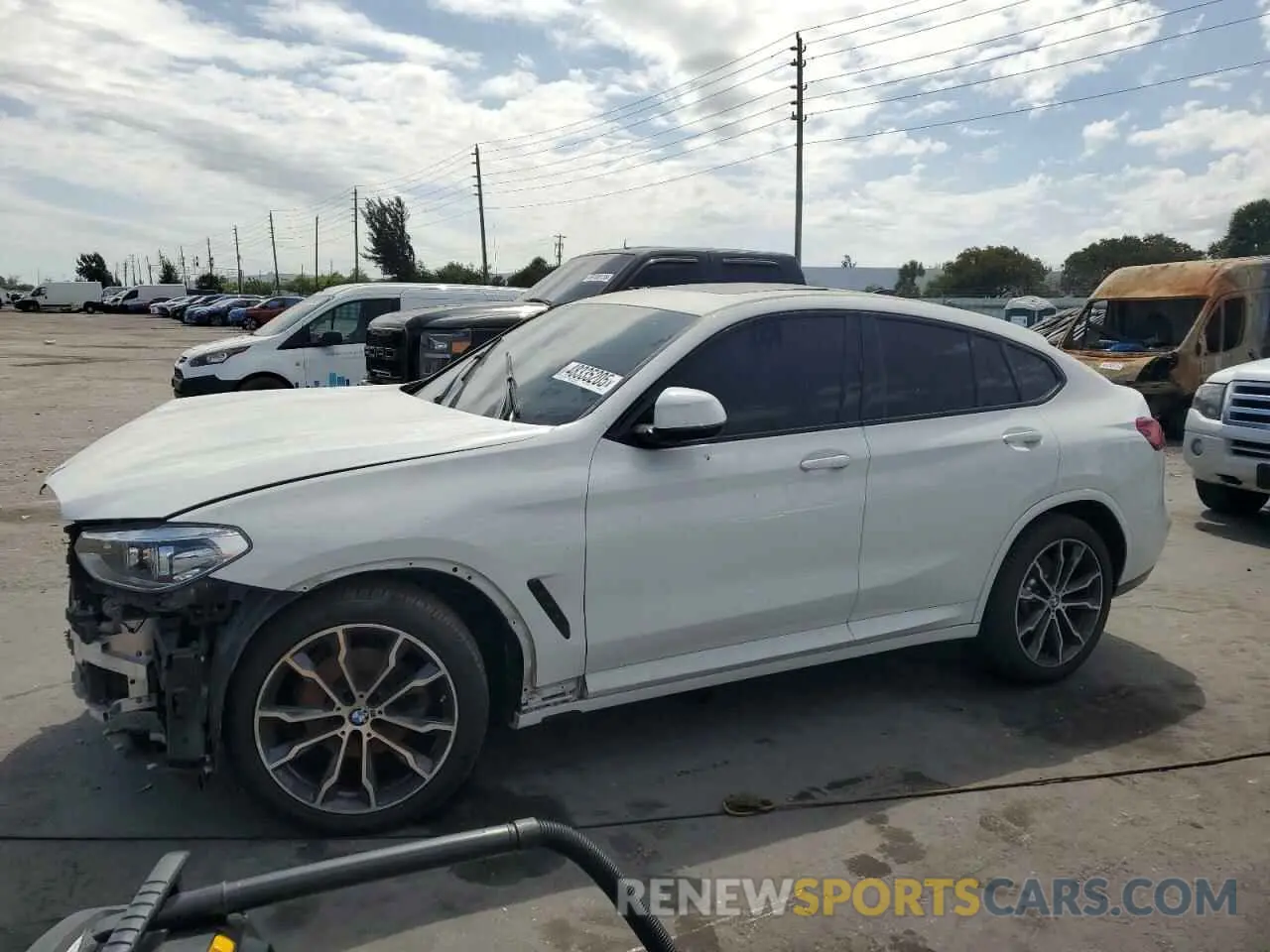 1 Photograph of a damaged car 5UX2V1C01M9E03922 BMW X4 2021