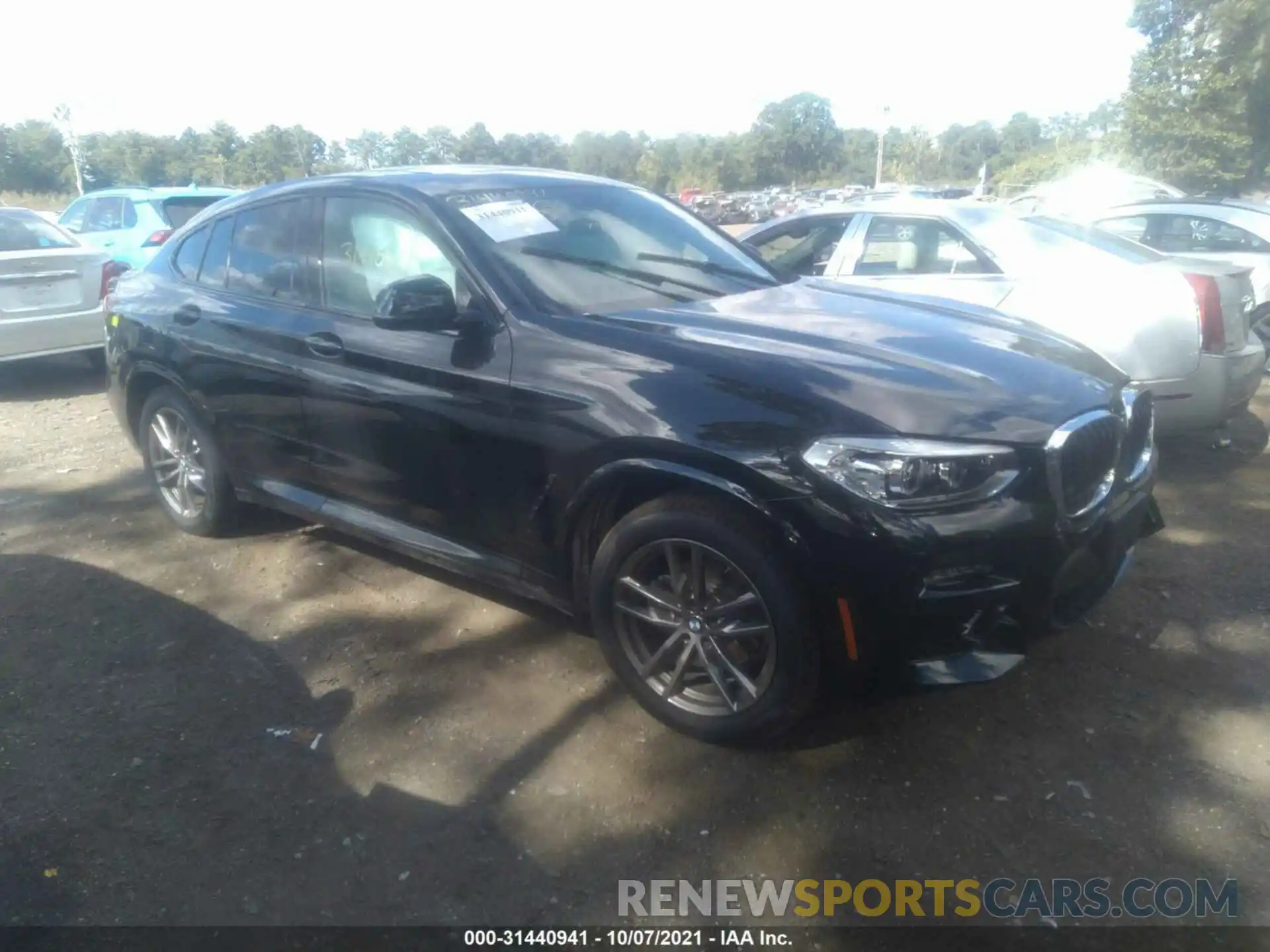 1 Photograph of a damaged car 5UX2V1C01M9H97552 BMW X4 2021