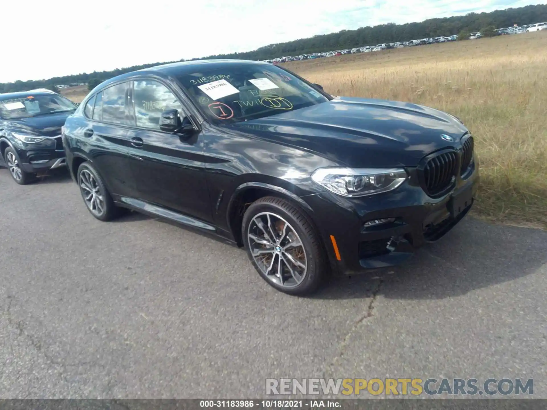 1 Photograph of a damaged car 5UX2V1C02M9H98984 BMW X4 2021