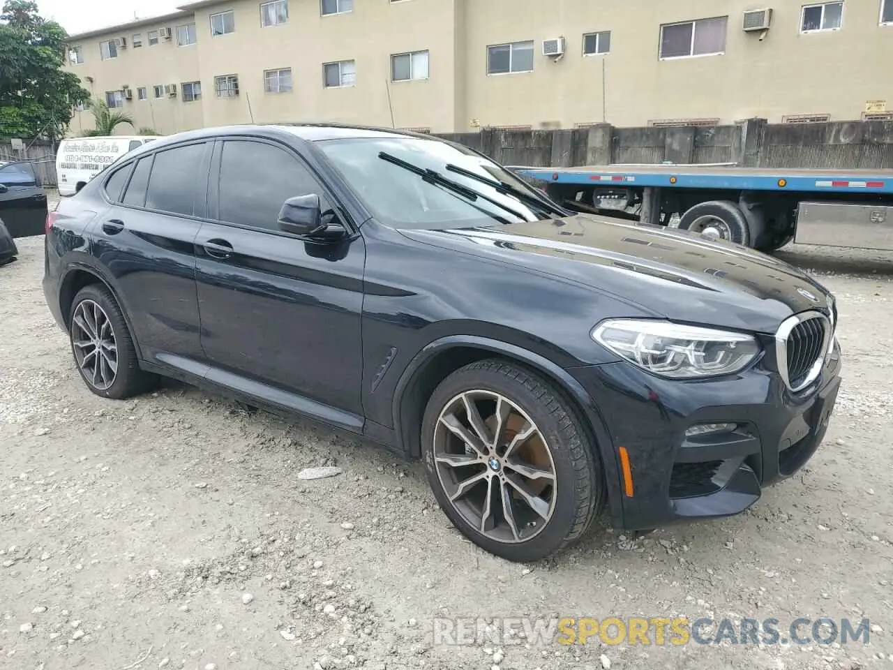 4 Photograph of a damaged car 5UX2V1C04M9F04579 BMW X4 2021