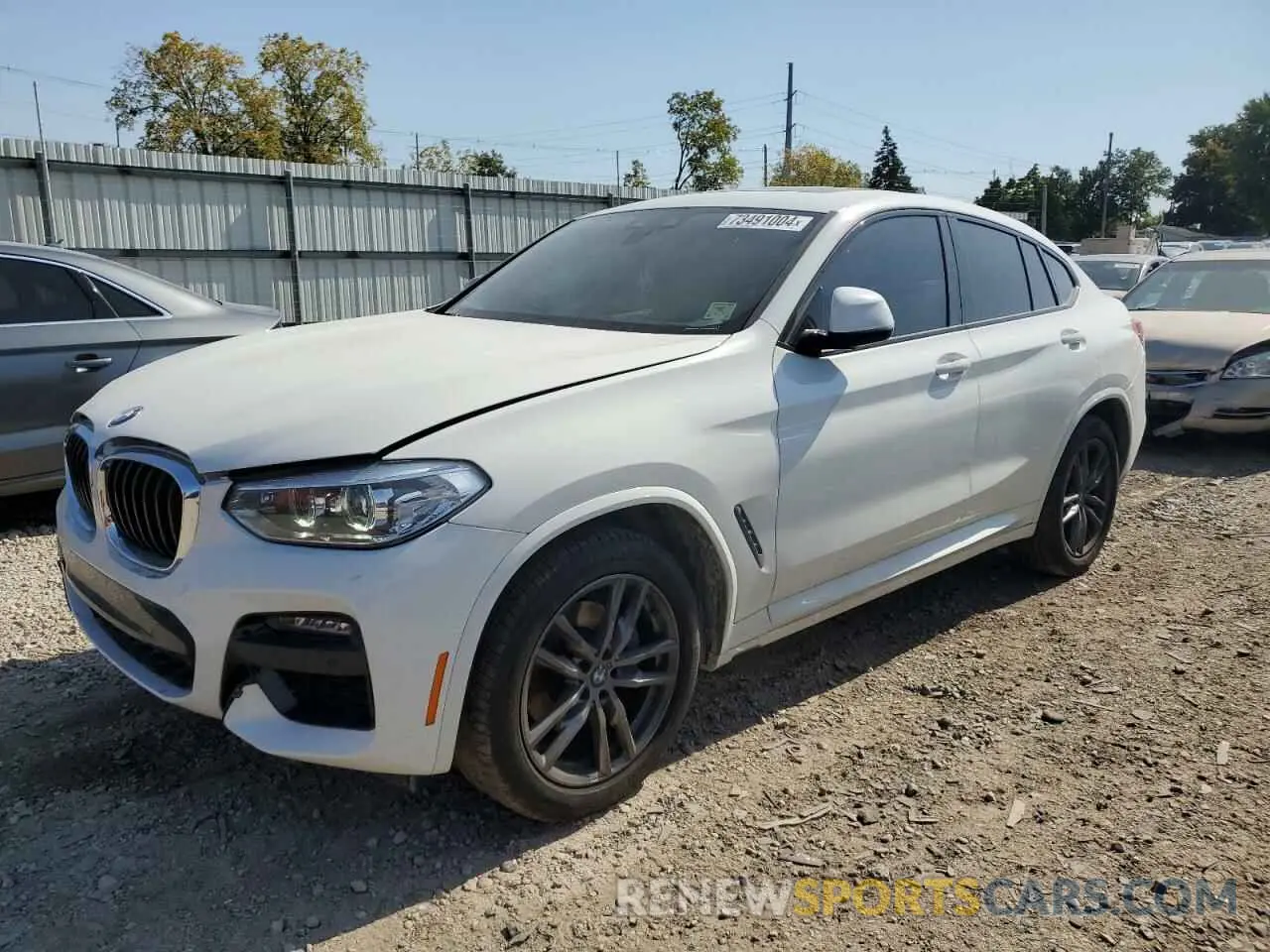 1 Photograph of a damaged car 5UX2V1C04M9H89087 BMW X4 2021