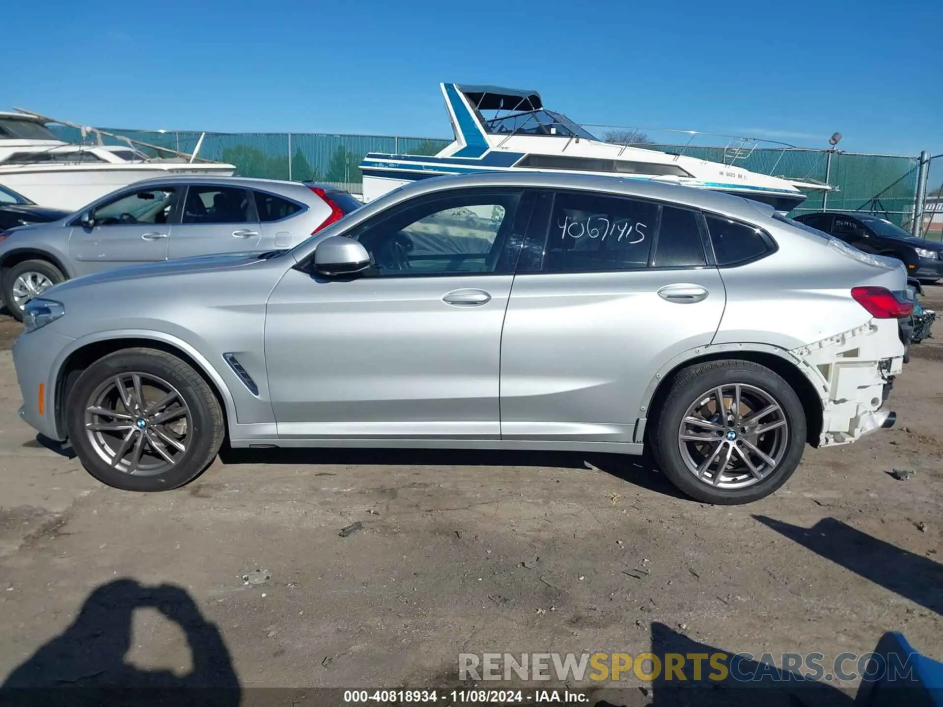 15 Photograph of a damaged car 5UX2V1C07M9F36930 BMW X4 2021