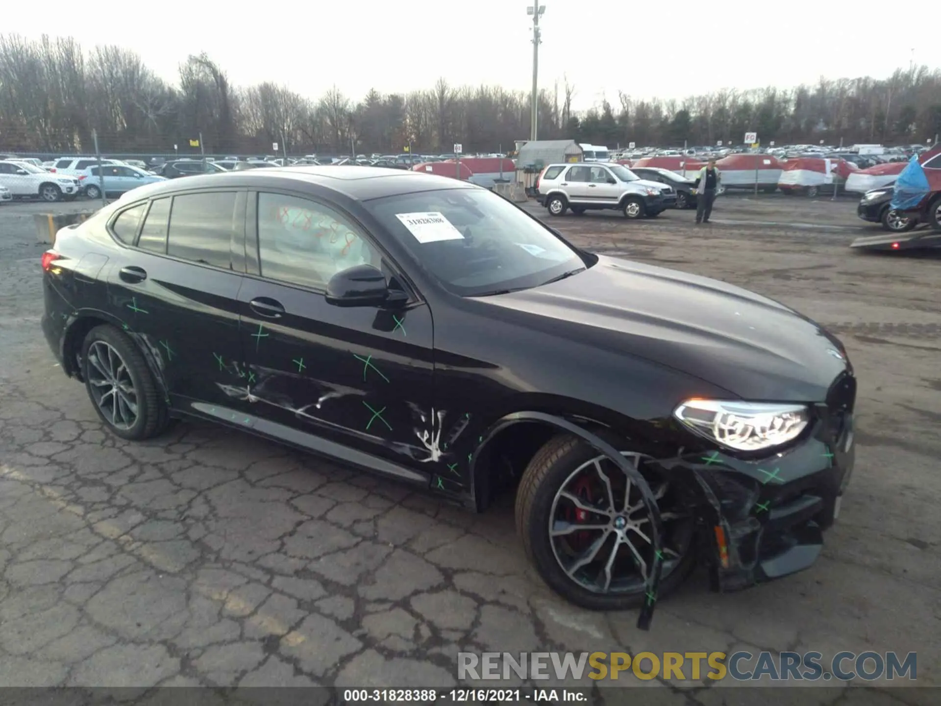 1 Photograph of a damaged car 5UX2V1C08M9F32014 BMW X4 2021