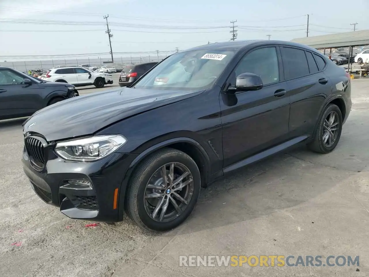 1 Photograph of a damaged car 5UX2V1C08M9H96852 BMW X4 2021