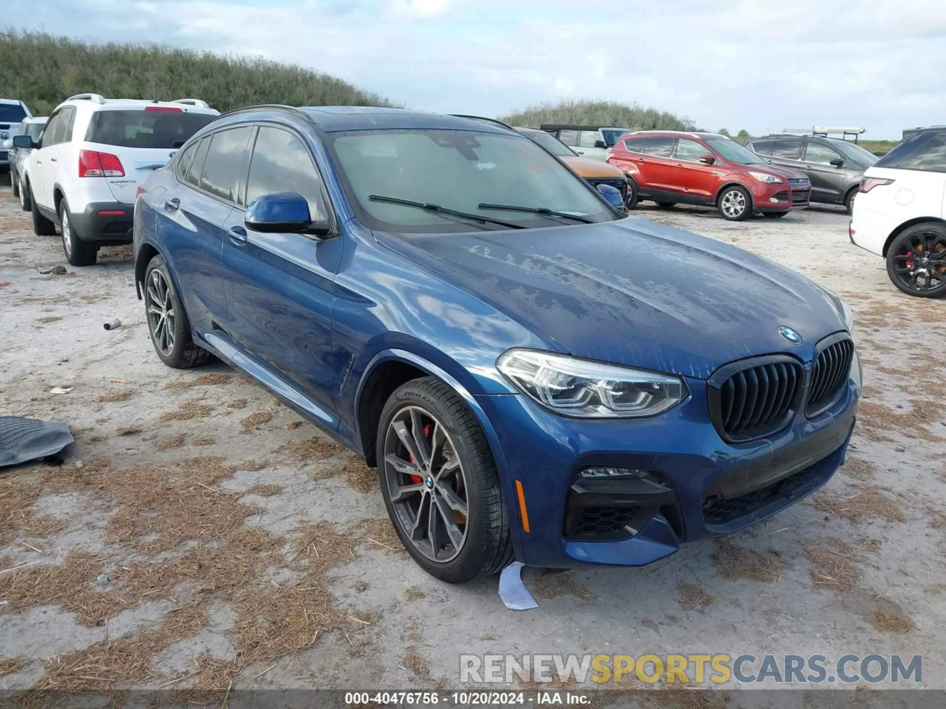 1 Photograph of a damaged car 5UX2V5C07M9H01267 BMW X4 2021