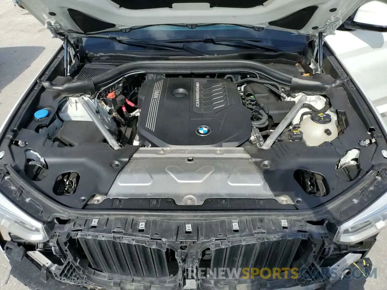 12 Photograph of a damaged car 5UX2V5C09M9E99886 BMW X4 2021